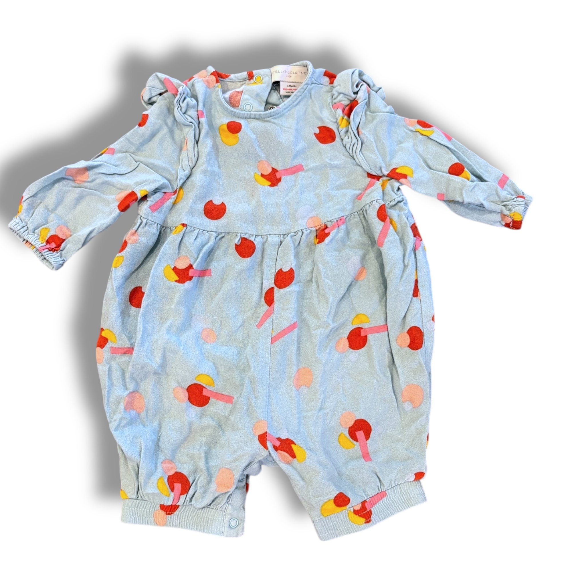 Size 6 month Stella Mccartney blue romper, rust/pink/yellow shapes