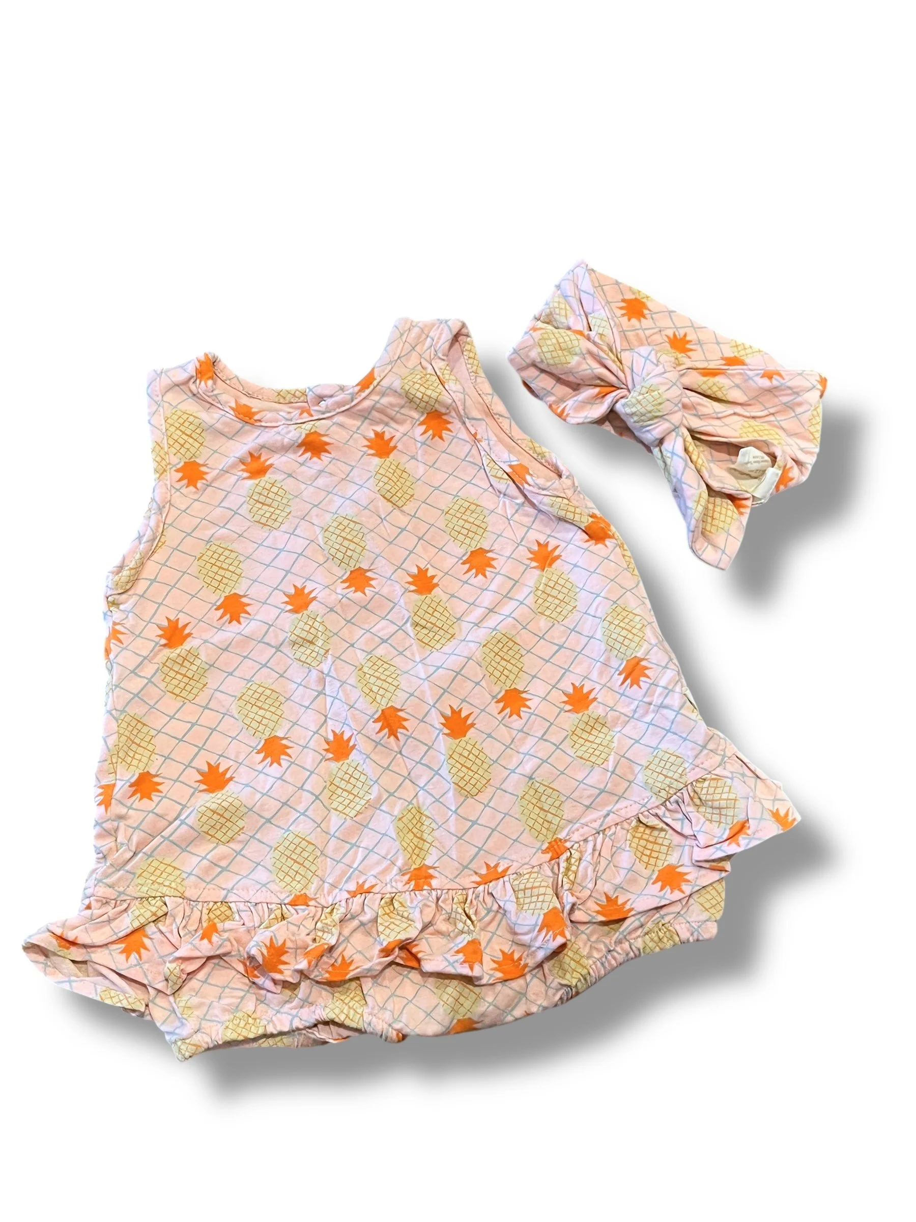 Size 6-12 month Charming Mary pink onesie dress with yellow/orange pineapples and a headband with a bow
