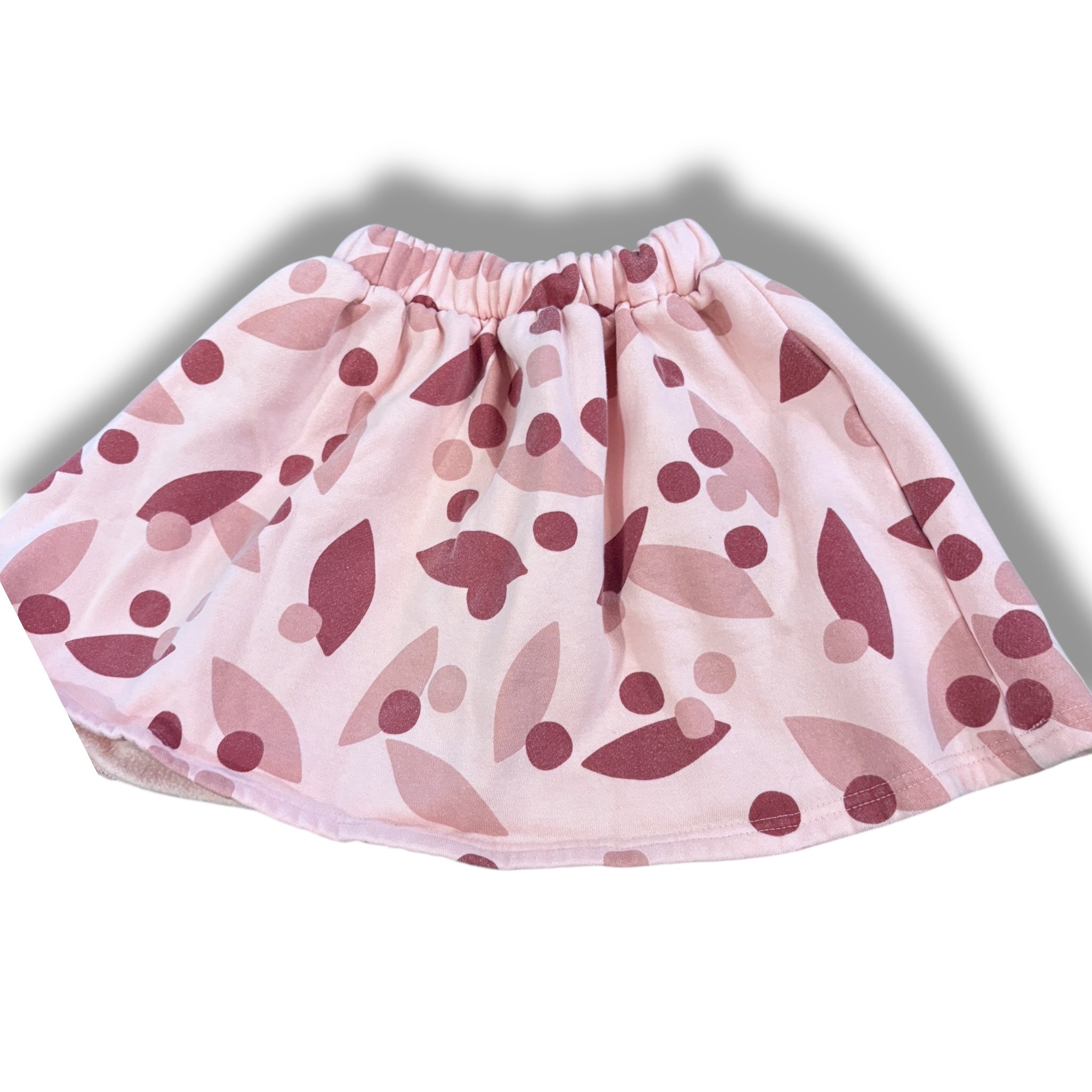 Size 6 pink knit skirt with mauve leaf shapes