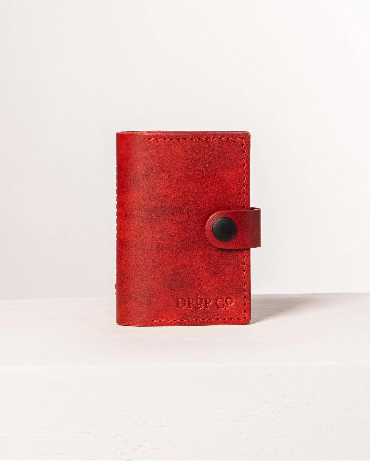 Keep your cards neatly arranged and easily accessible with this elegant leather organizer. Featuring 20 dedicated card pockets and a secure snap button closure, it combines functionality with timeless style.

-Crafted from Buttero Museum leather by C