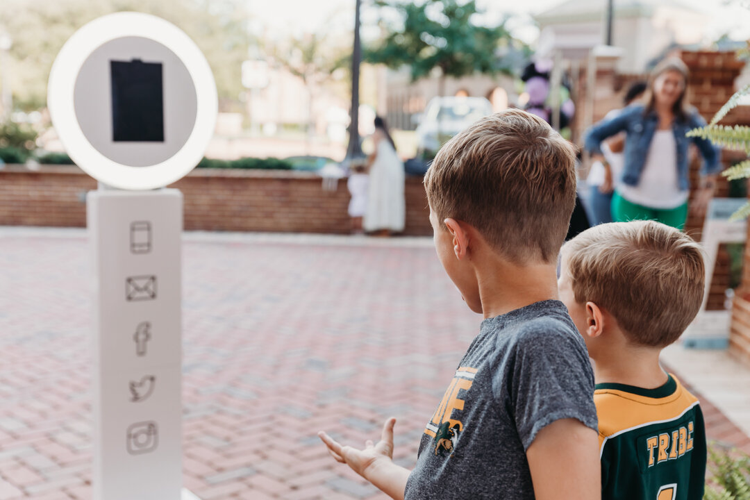 Say cheese! Our portable photo booth will provide hours of fun for all of your guests at any event...trust us, we've seen it!