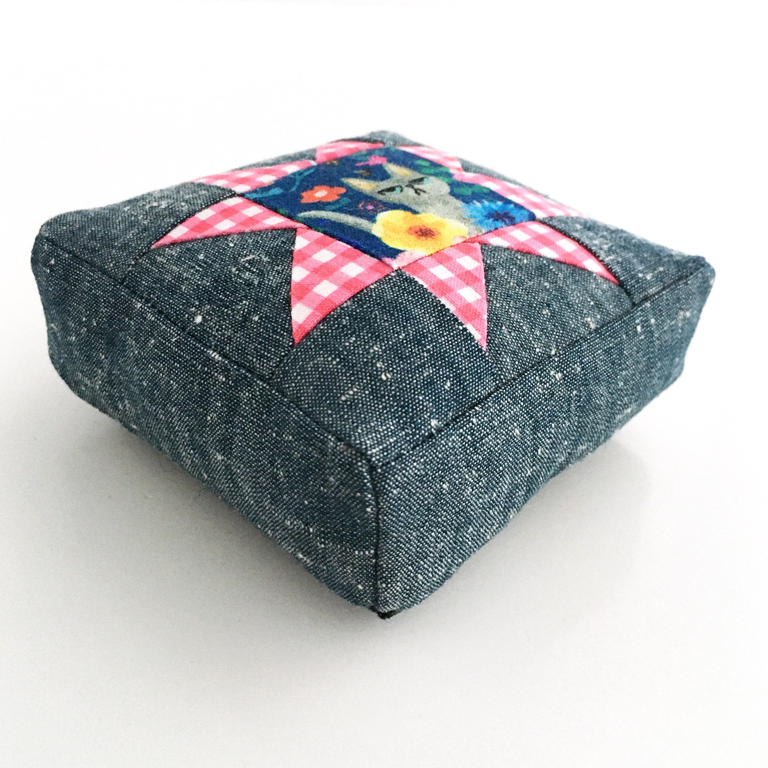 Side view of the pincushion made with the Sawtooth Star Pincushion sewing pattern.