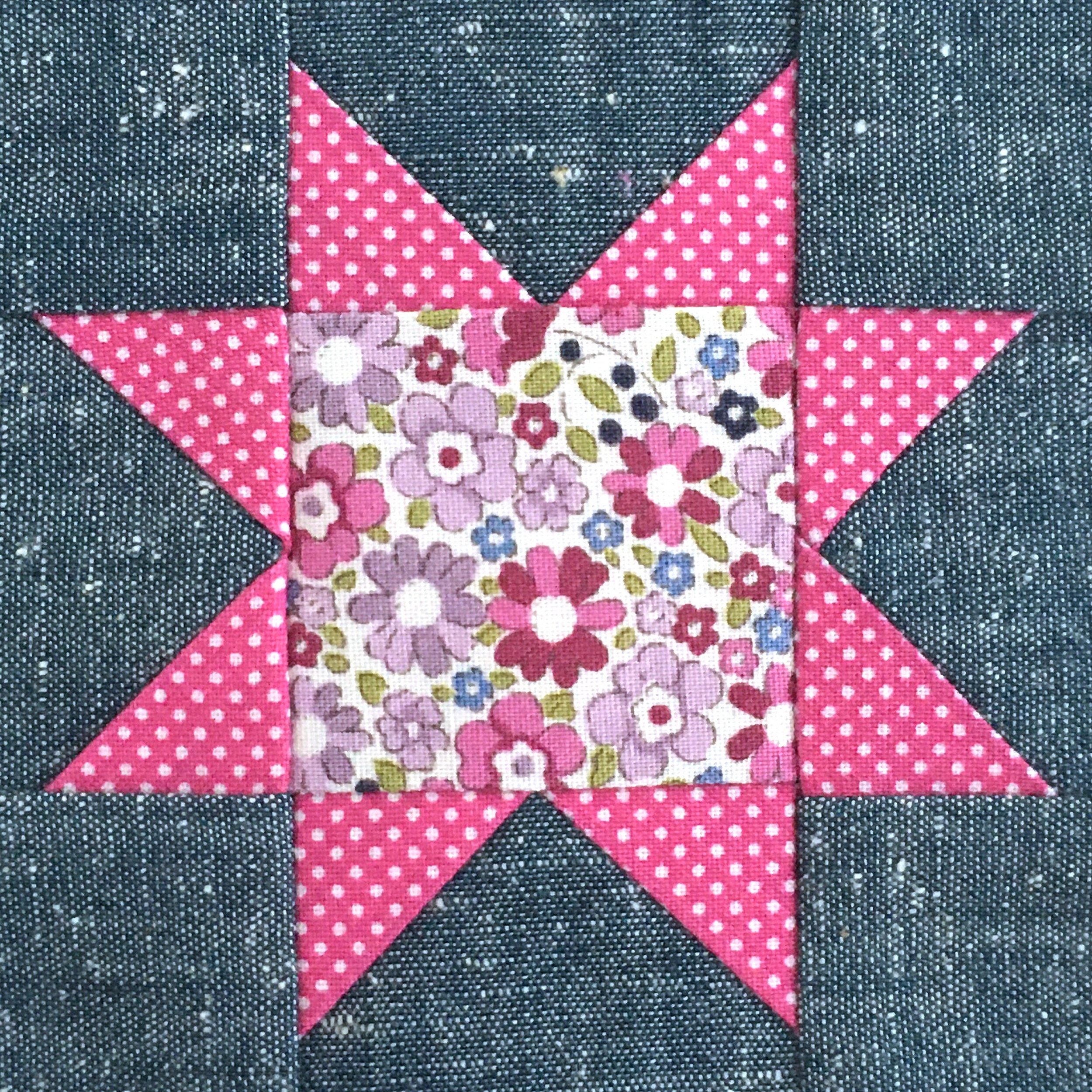 Sawtooth Star block made from chambray fabric and pink pin dot quilting cotton.