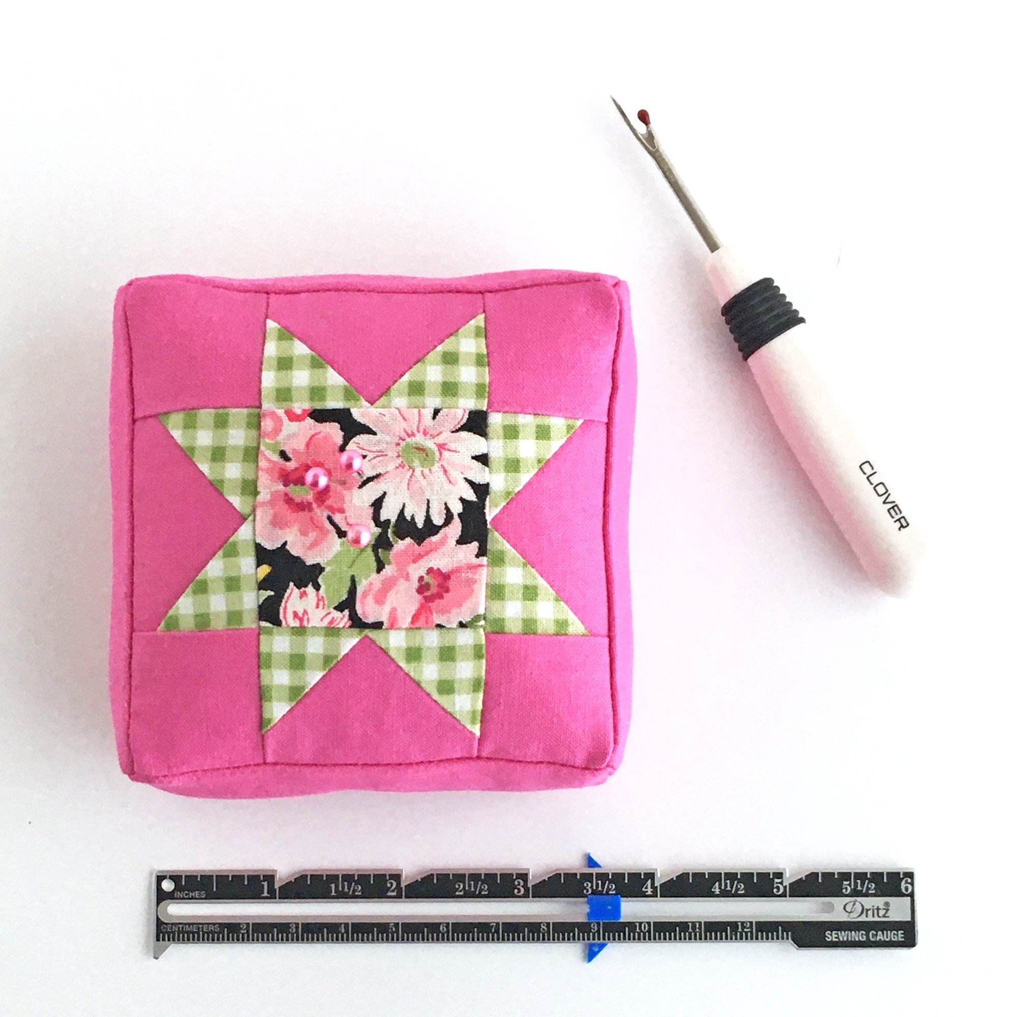 Hot pink Kona cotton small square pin cushion.