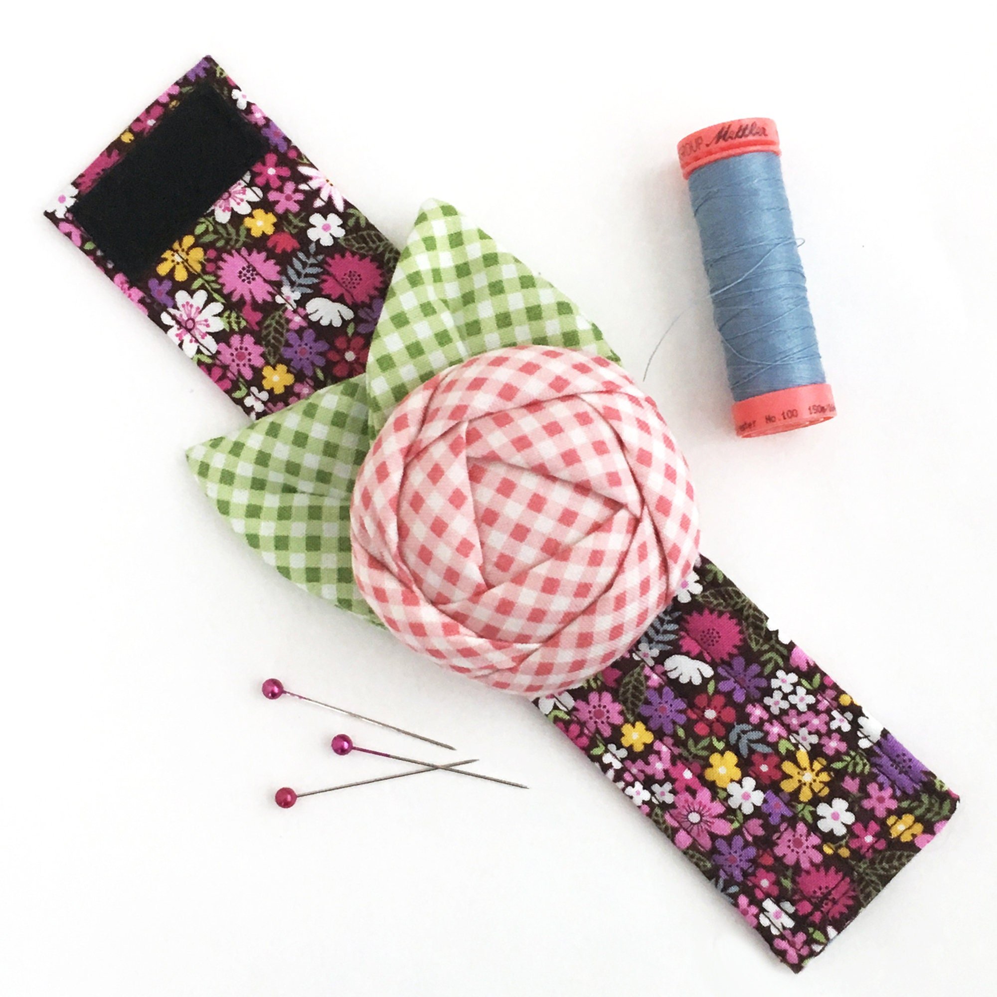 Pink gingham Rose Pincushion Cuff with floral cuff and green gingham leaves.