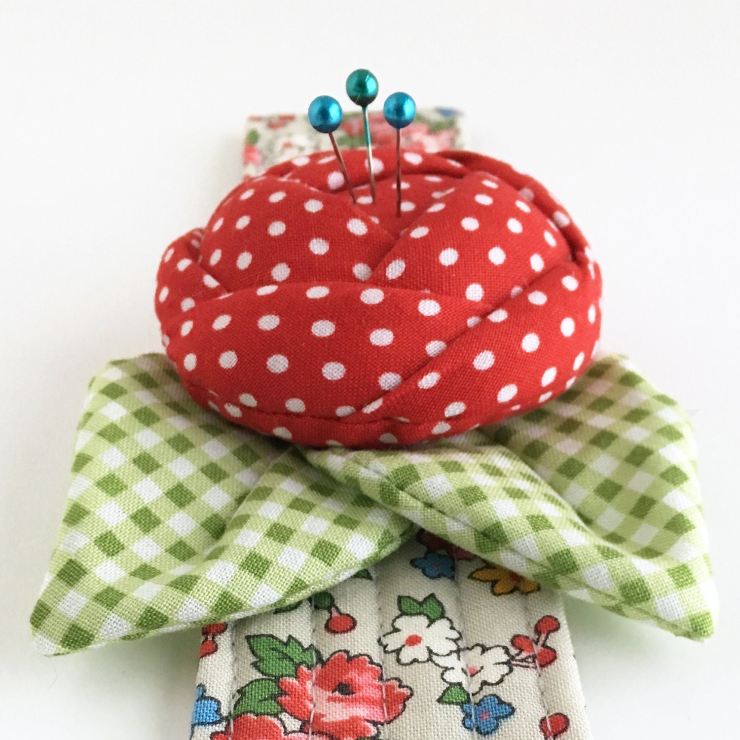 Close up of Rose Pincushion Cuff from the side.