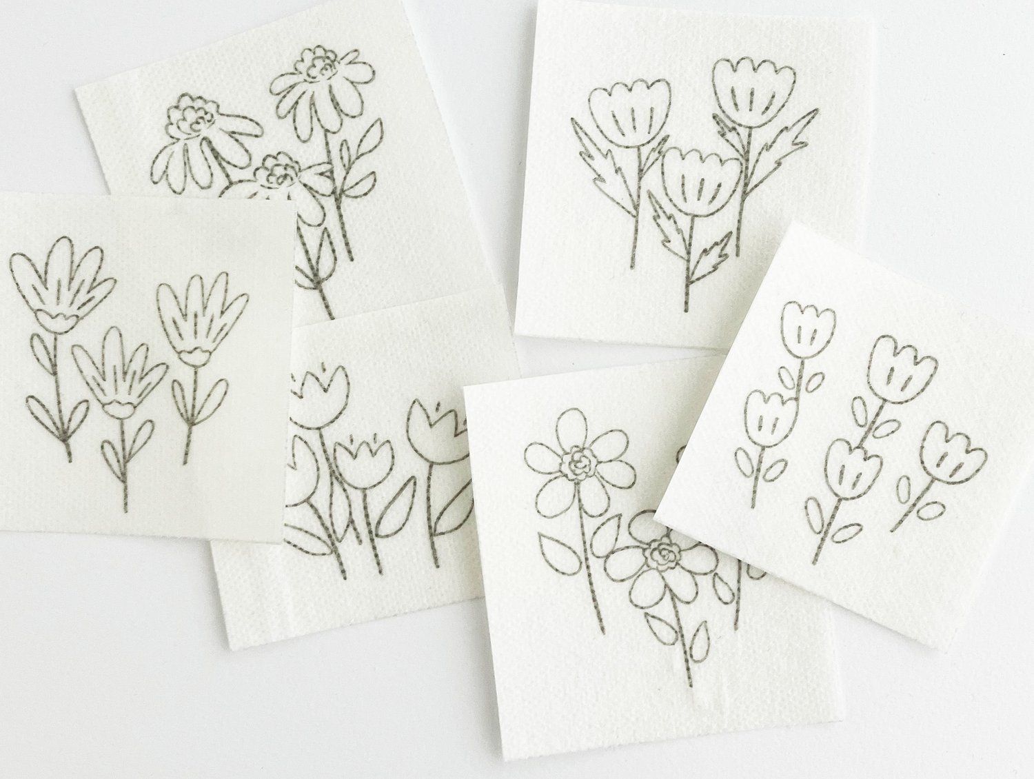Collection of small wildflower designs on water soluble adhesive