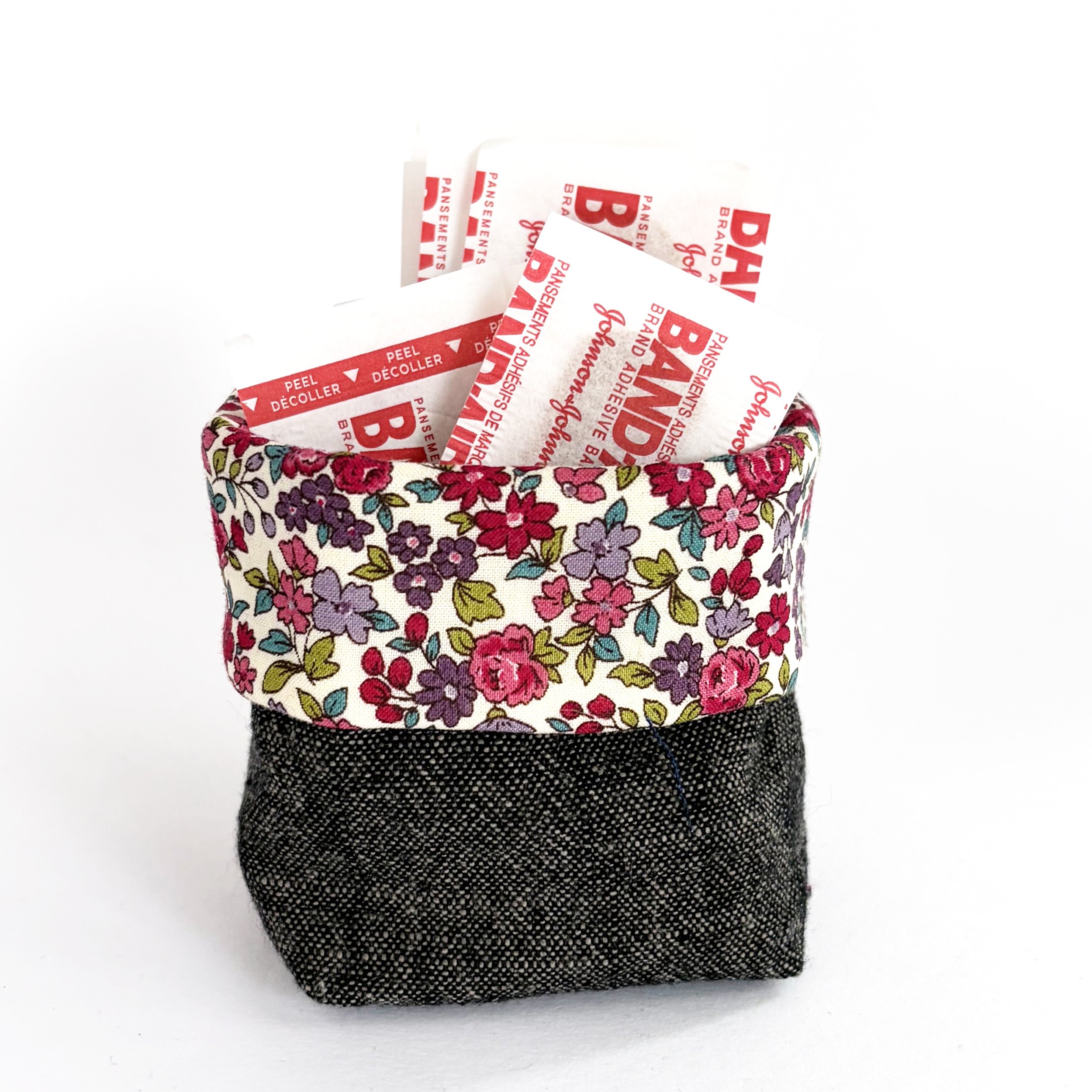 Small storage bin for bandages.