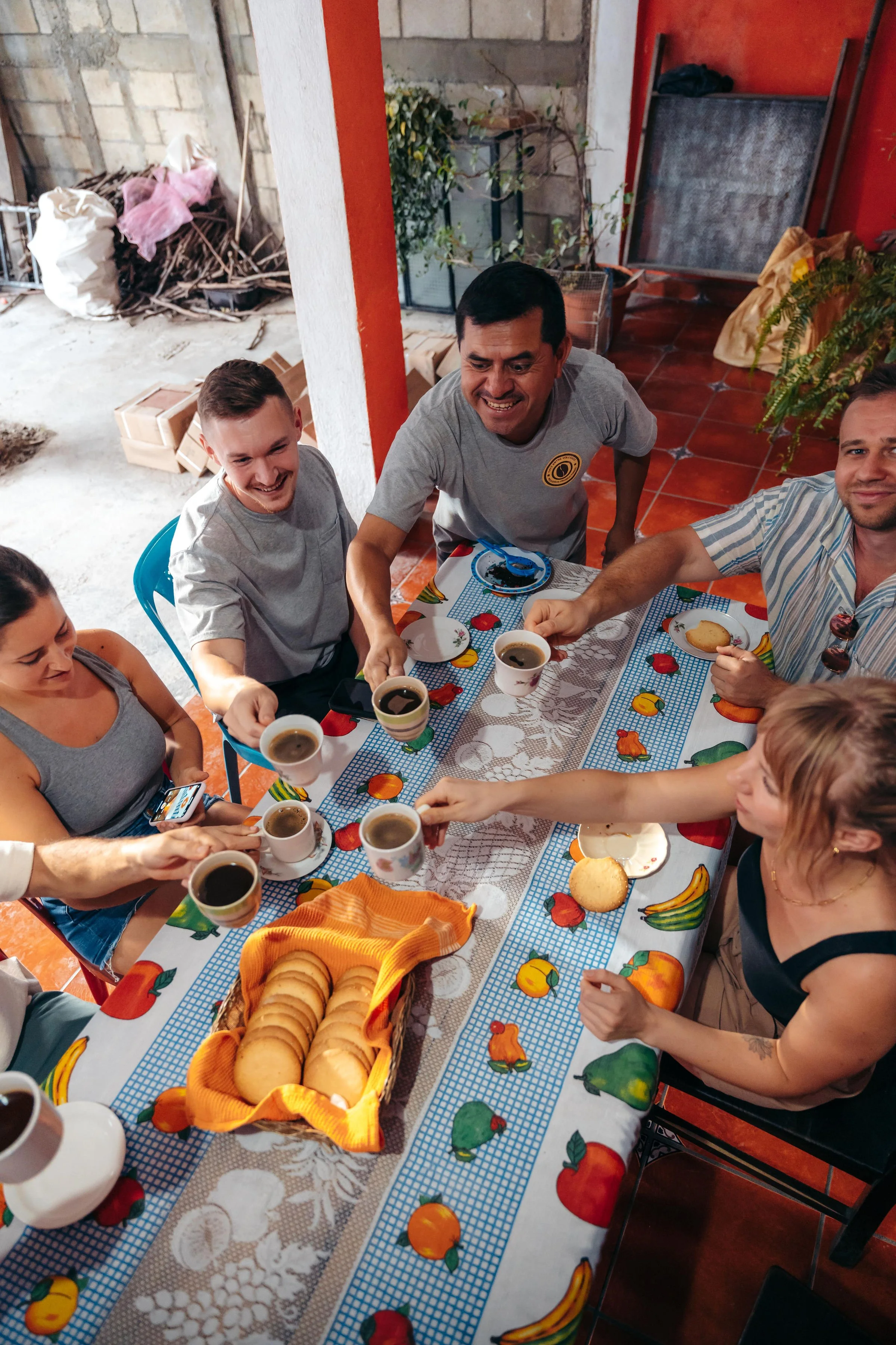 group enjoying coffee together - coffee moments - coffee origin trip De La Gente
