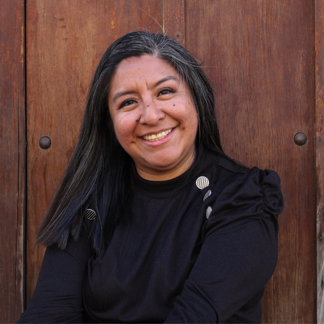 Portrait of Claudia - Community Tourism Program manager at De La Gente - Interpreter roles