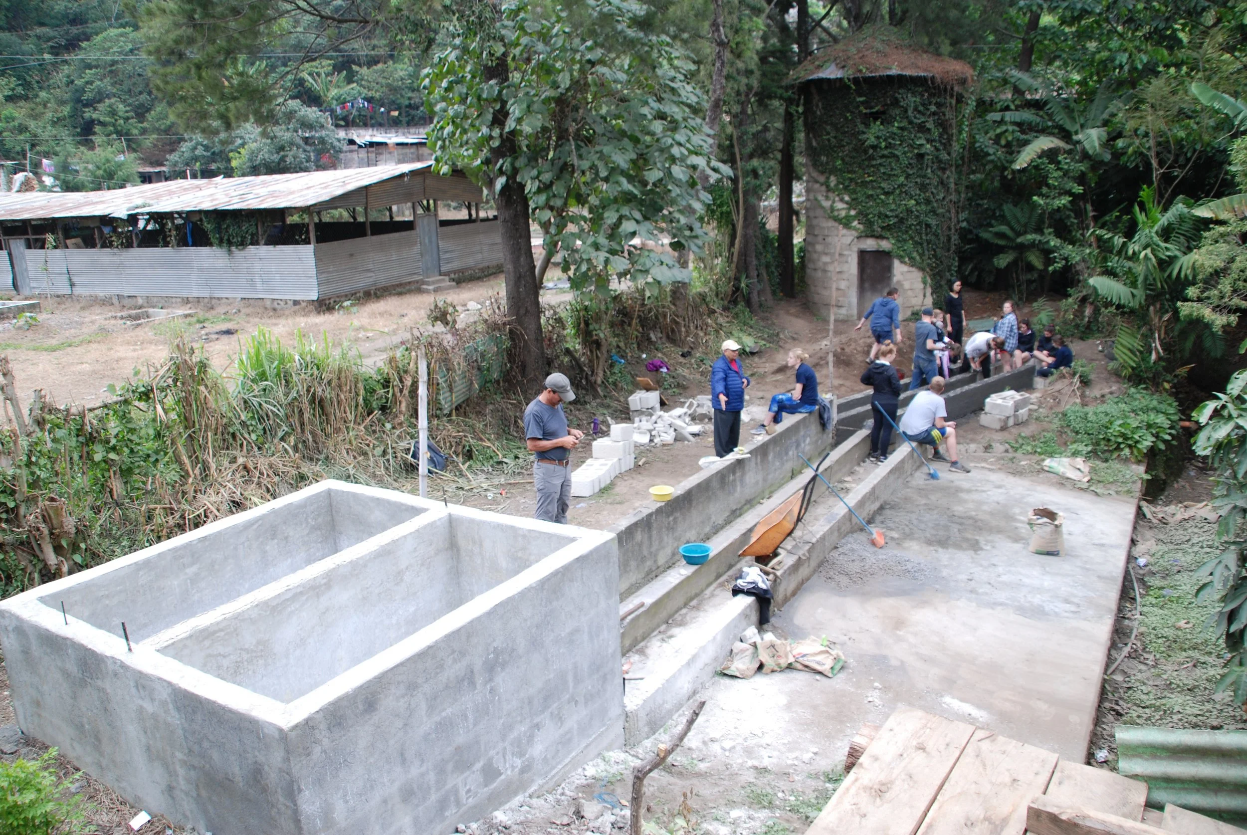 fermentation tanks and washing channels - washed processed coffee | coffee farming community