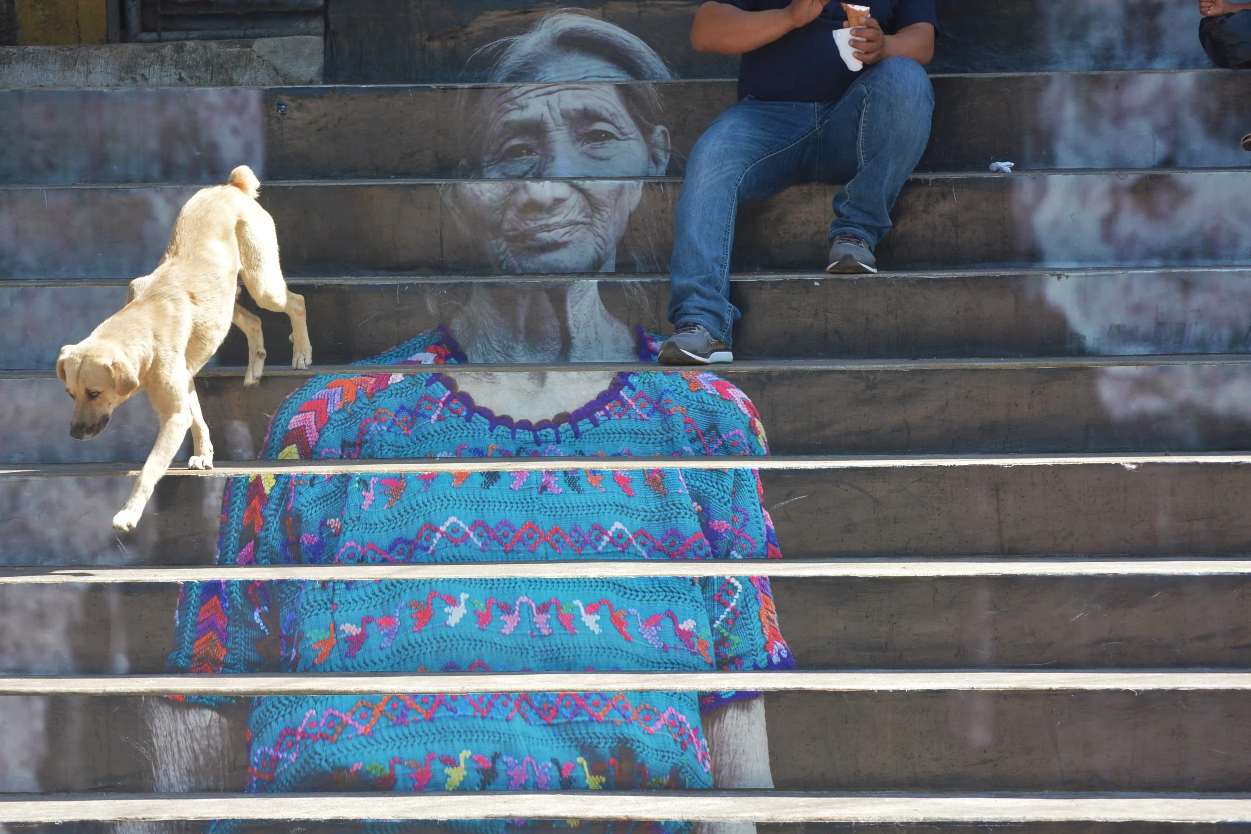 painting of Mayan woman in town of Indigenous farming community