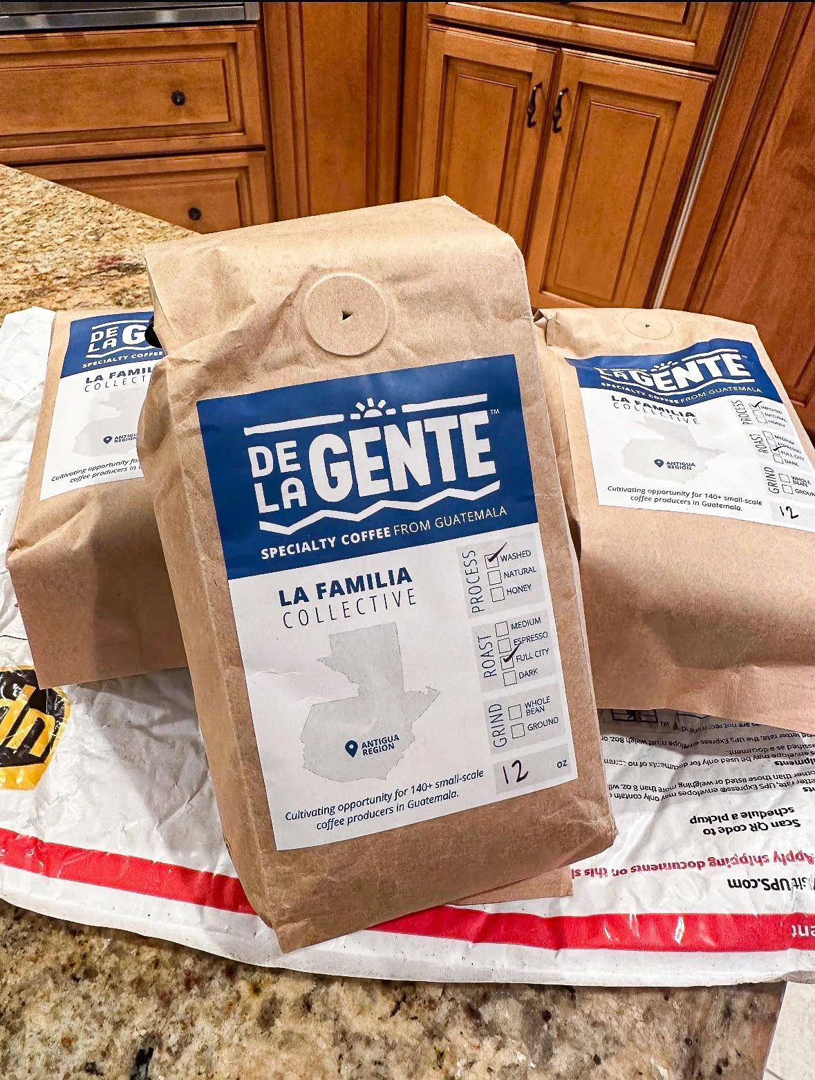 12 oz bag of roasted coffee beans with De La Gente label