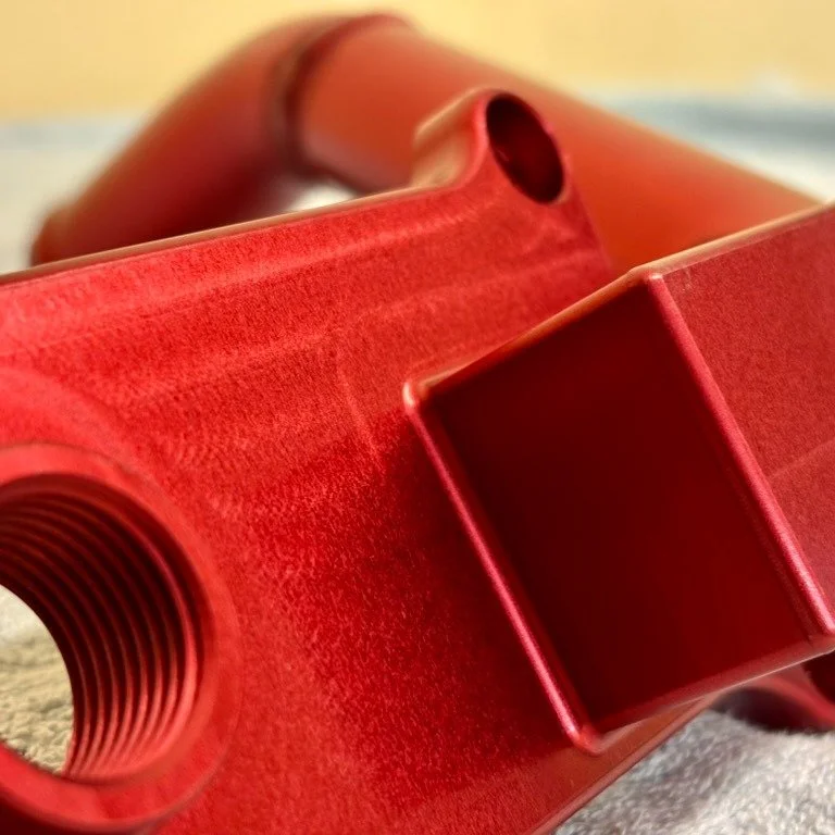 Deep red machined part, anodised Type II (25 micron) for a very happy customer. We really enjoy working alongside New Zealand's diverse and highly skilled machining and engineering shops; they produce world class parts for every conceivable industry.
