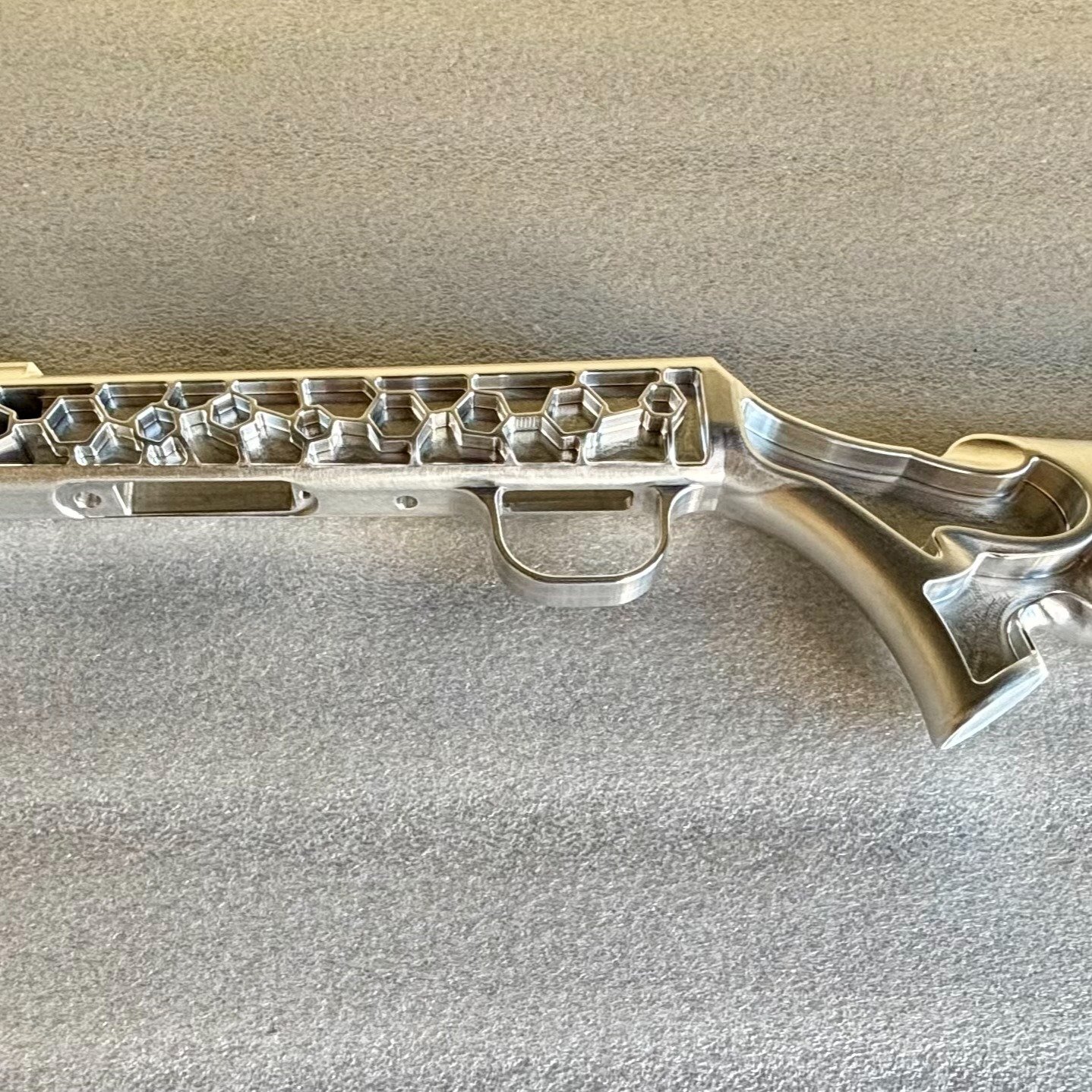 Every now and again we have the privilege of anodising a unique piece; where form meets function, and art intersects science. This beautifully machined gun stock and suppressor assembly was carefully anodised to a very deep purple. An iconic colour, 