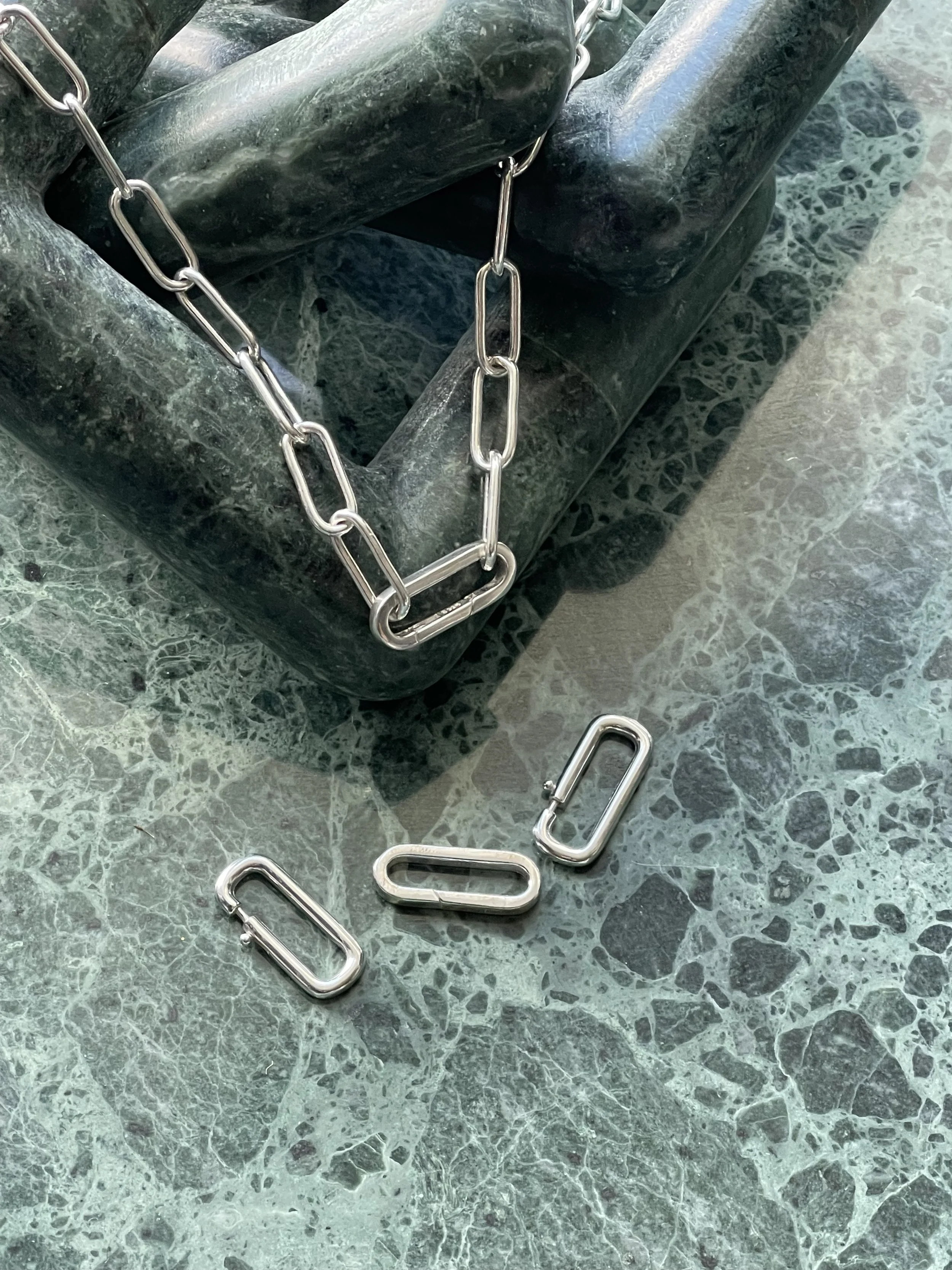 Paper clip clasps