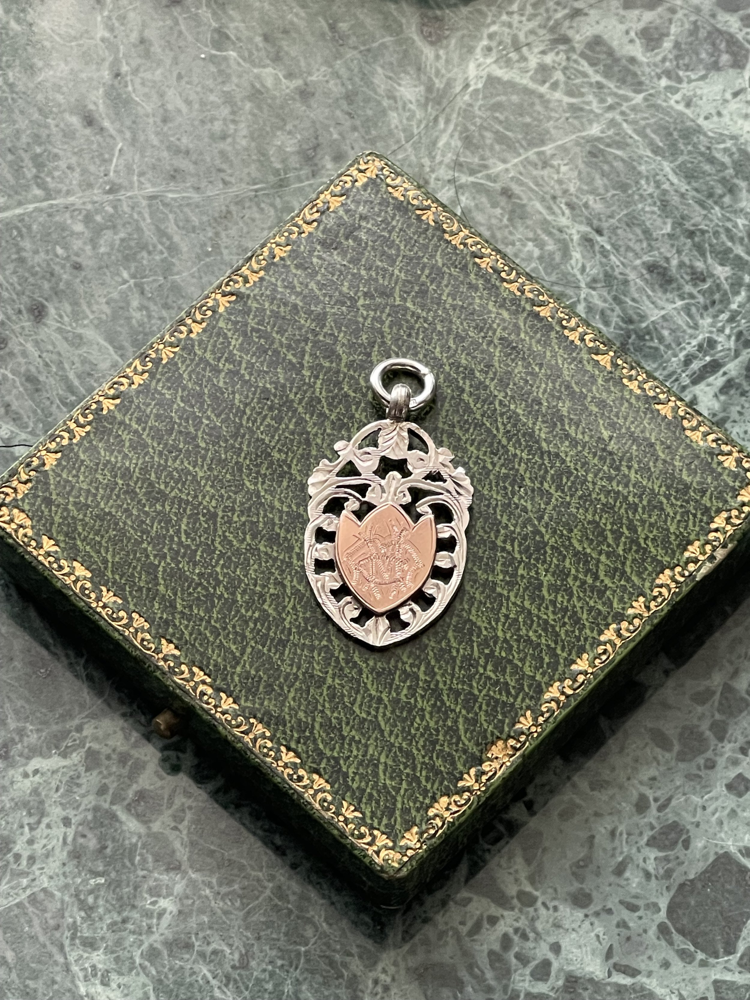 Antique silver and gold fob, from 1919