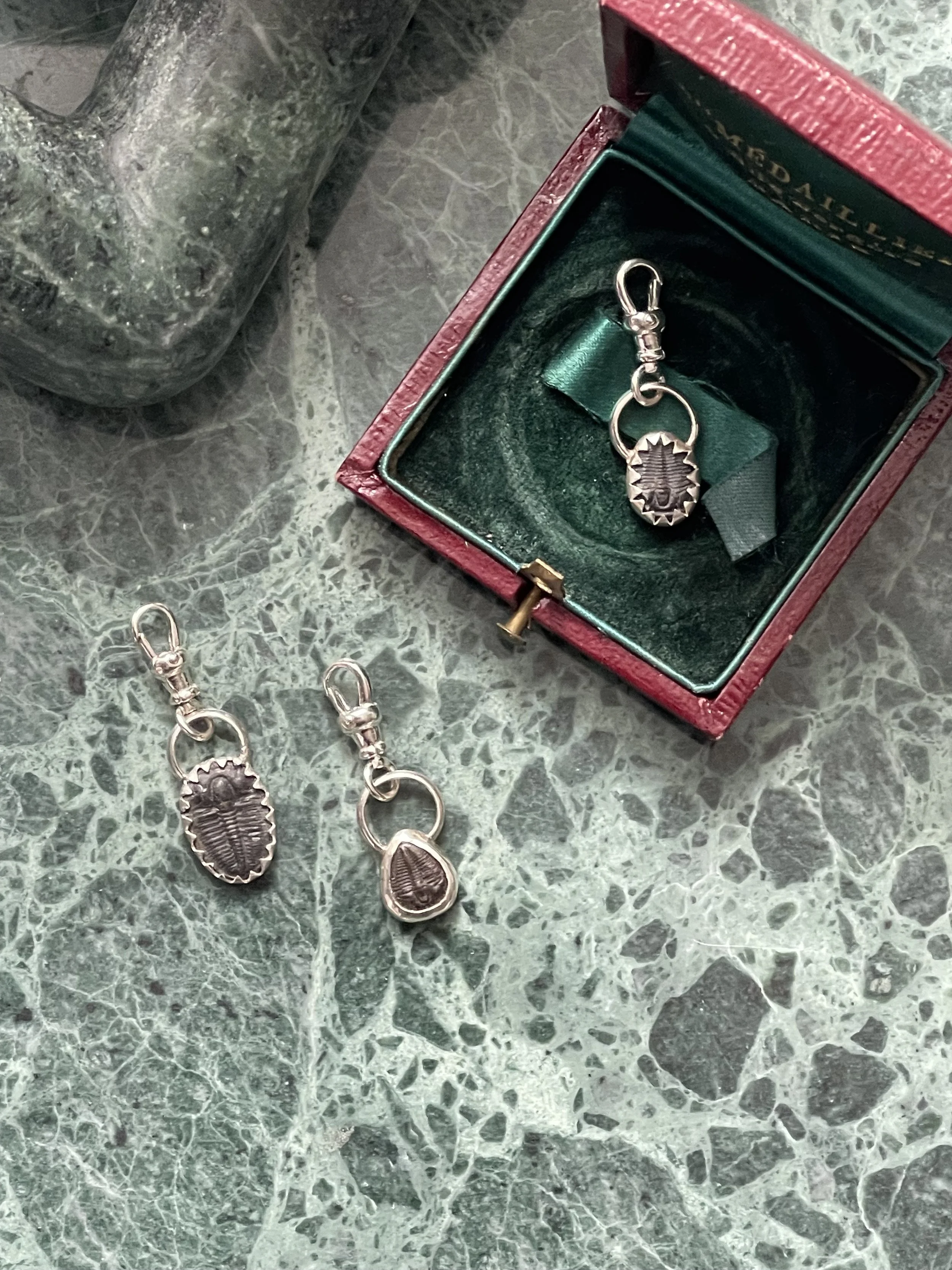 Tiny trilobite charms