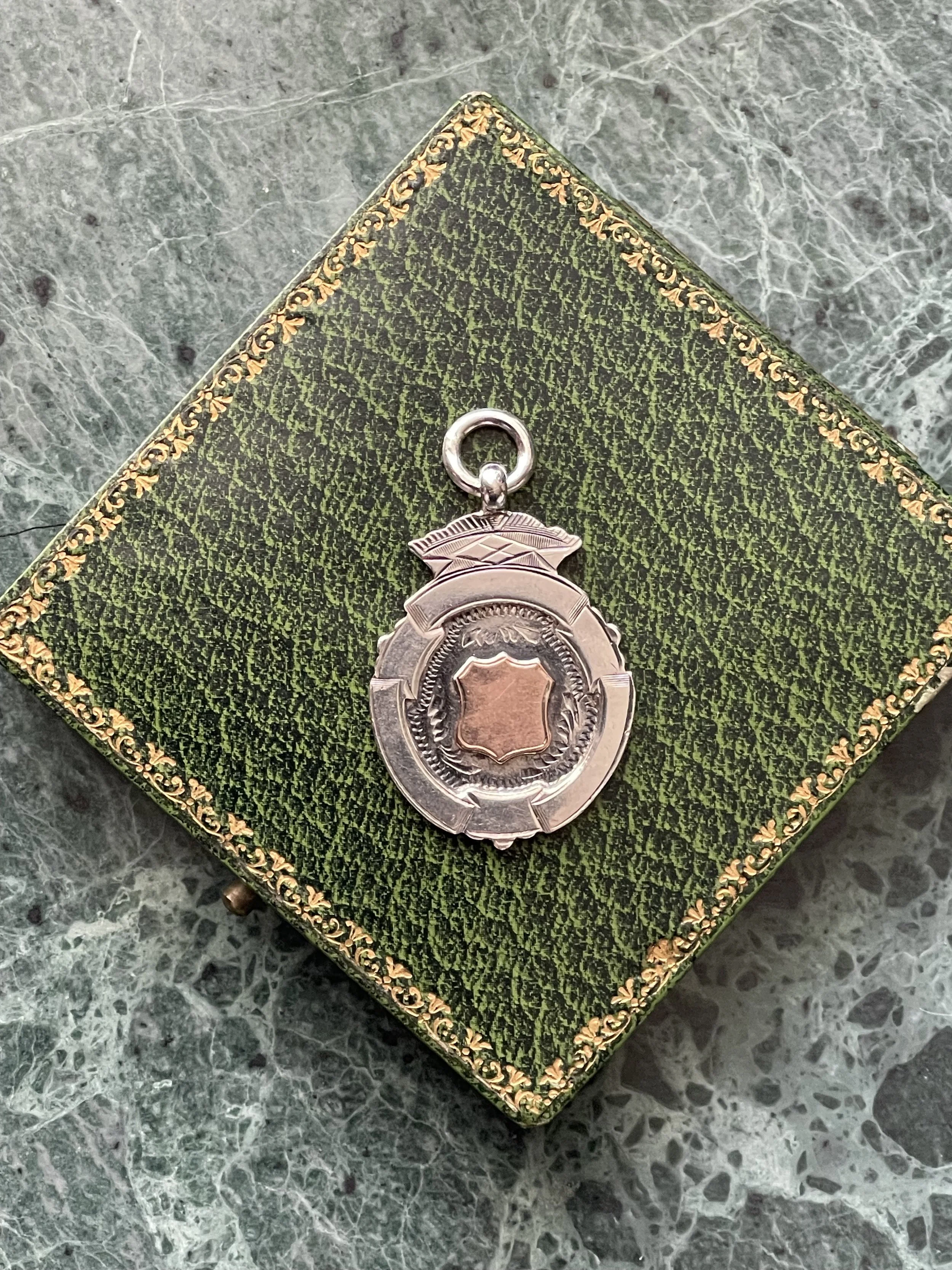 Antique silver & gold fob, from 1937