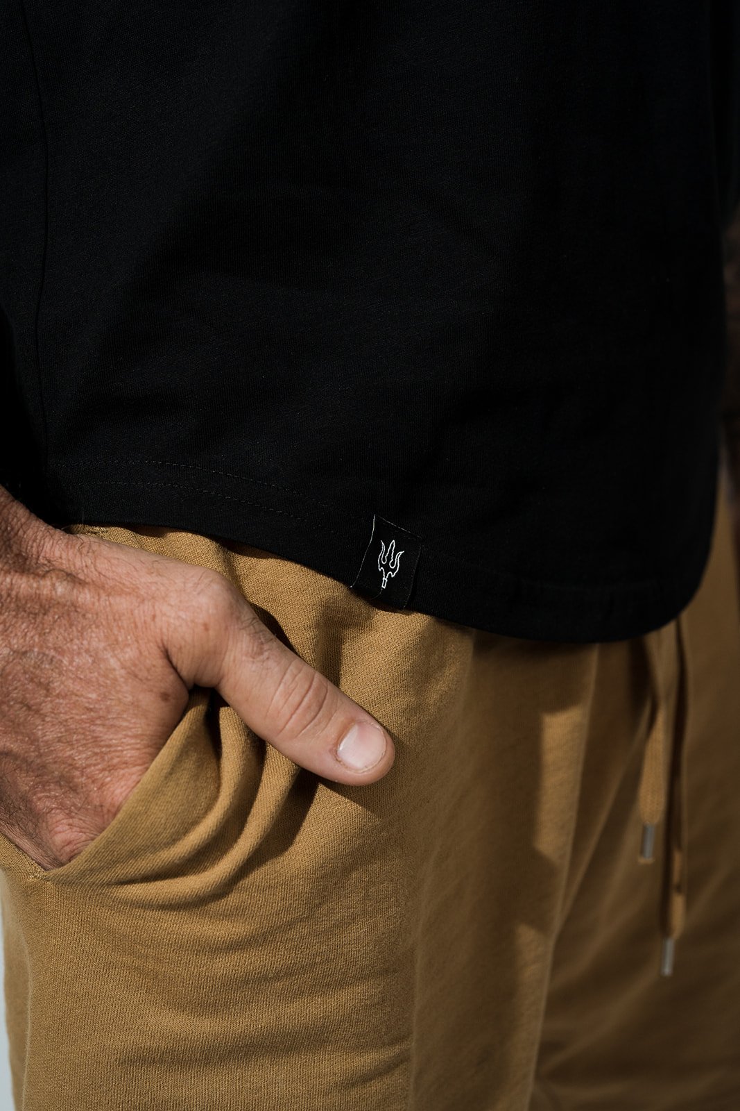 curved hem lable trident.jpg