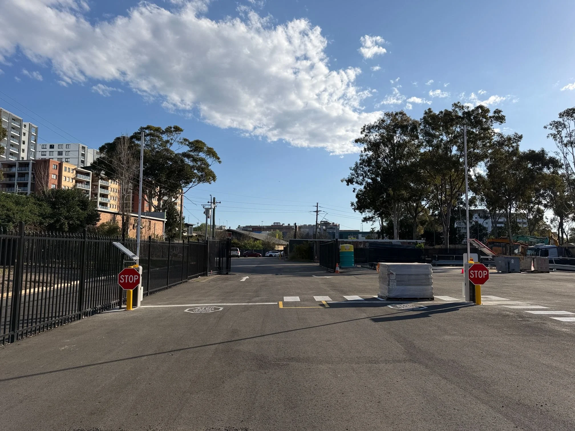 How We Designed a Dual Solar Boom Gate System for a 10-Metre Entrance in Fairfield NSW