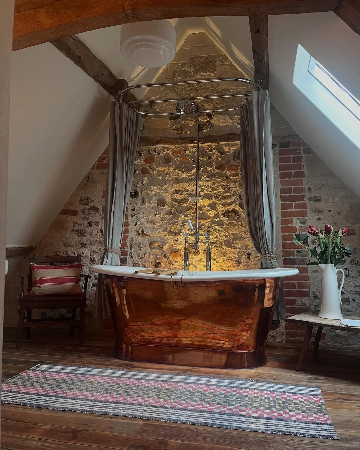 A Christmas shout out to the skilled artisans who worked on the refurbishment of my own home, featured in this month&rsquo;s edition of @houseandgardenuk - here is an unseen bathroom featuring a historic wall, once with an aperture to test bells when