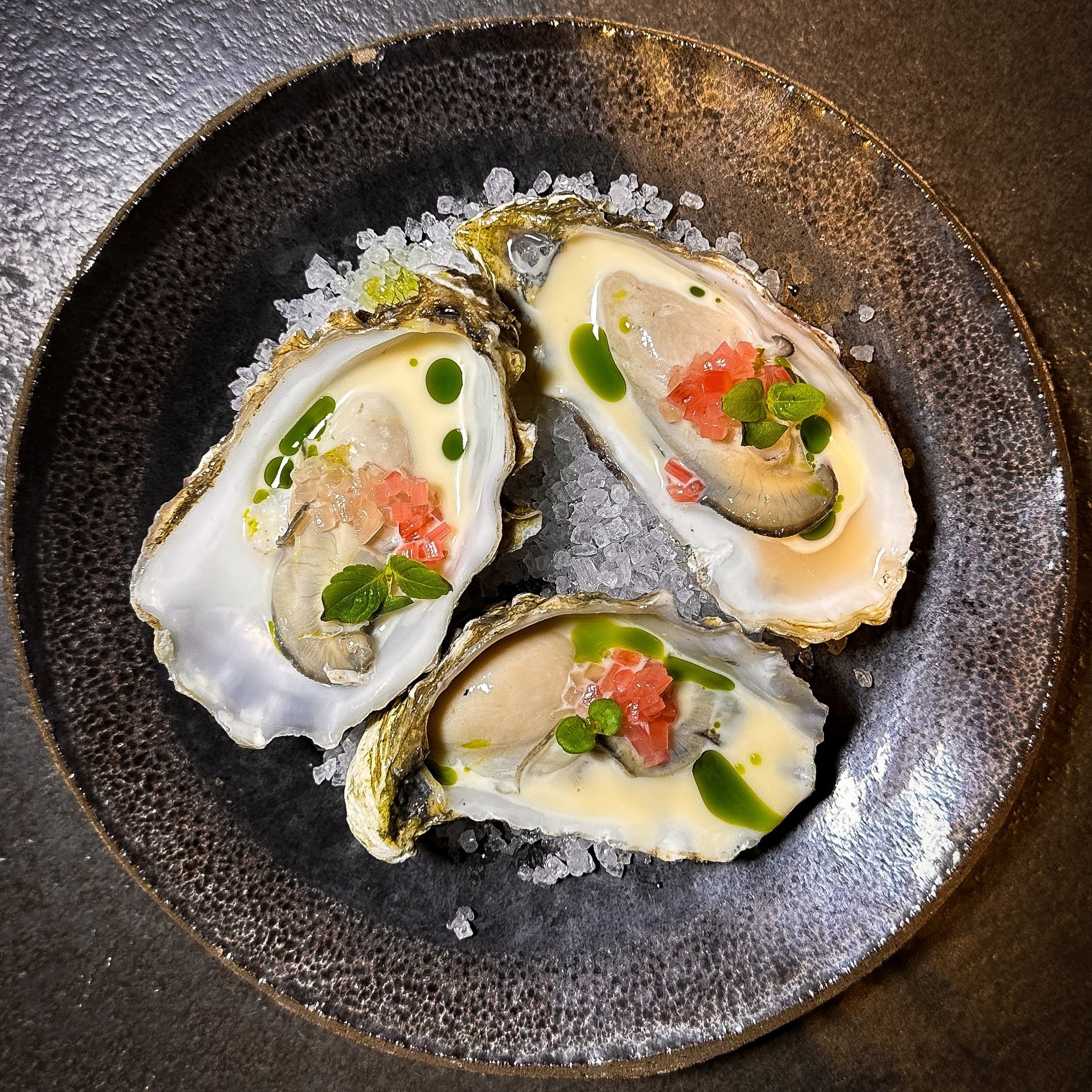 Poached Colchester Oysters | Forced Rhubarb | Pickled Shallot 

The new oyster garnish with a beautiful rhubarb emulsion made with our preserved rhubarb vinegar. A perfect balance to salty oysters this sweet and sour rhubarb - delicious!

#liverpoolf