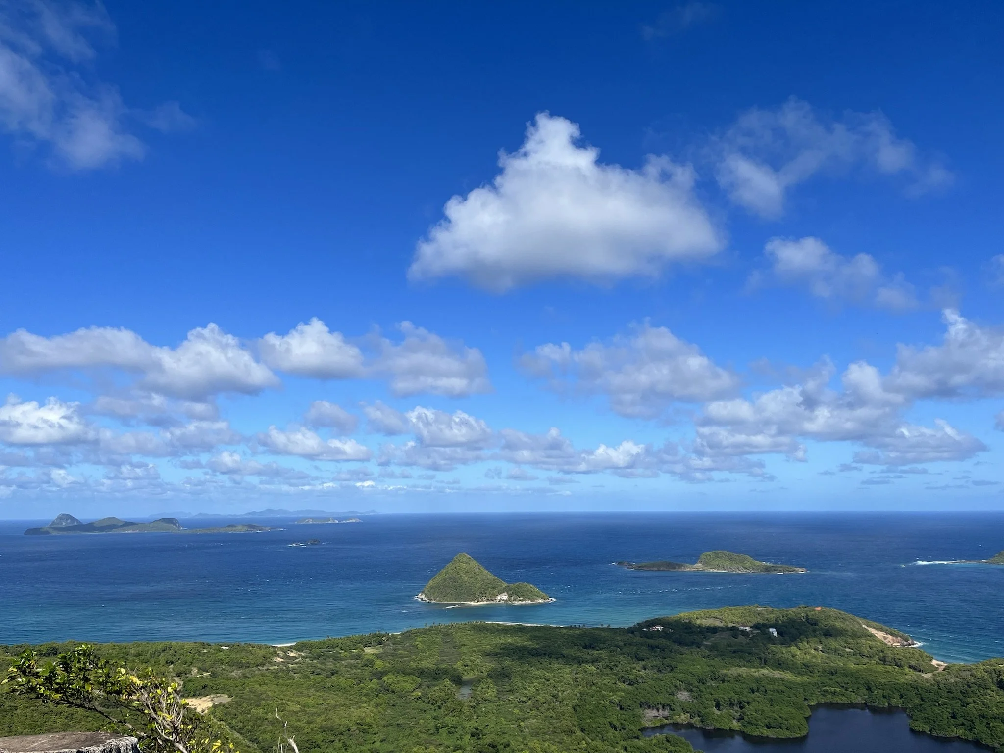 View from Levera National Park looking out over Sugar Loaf, Green Island and Sandy Island. Ronde Island and Carriacou can be seen in the distance.