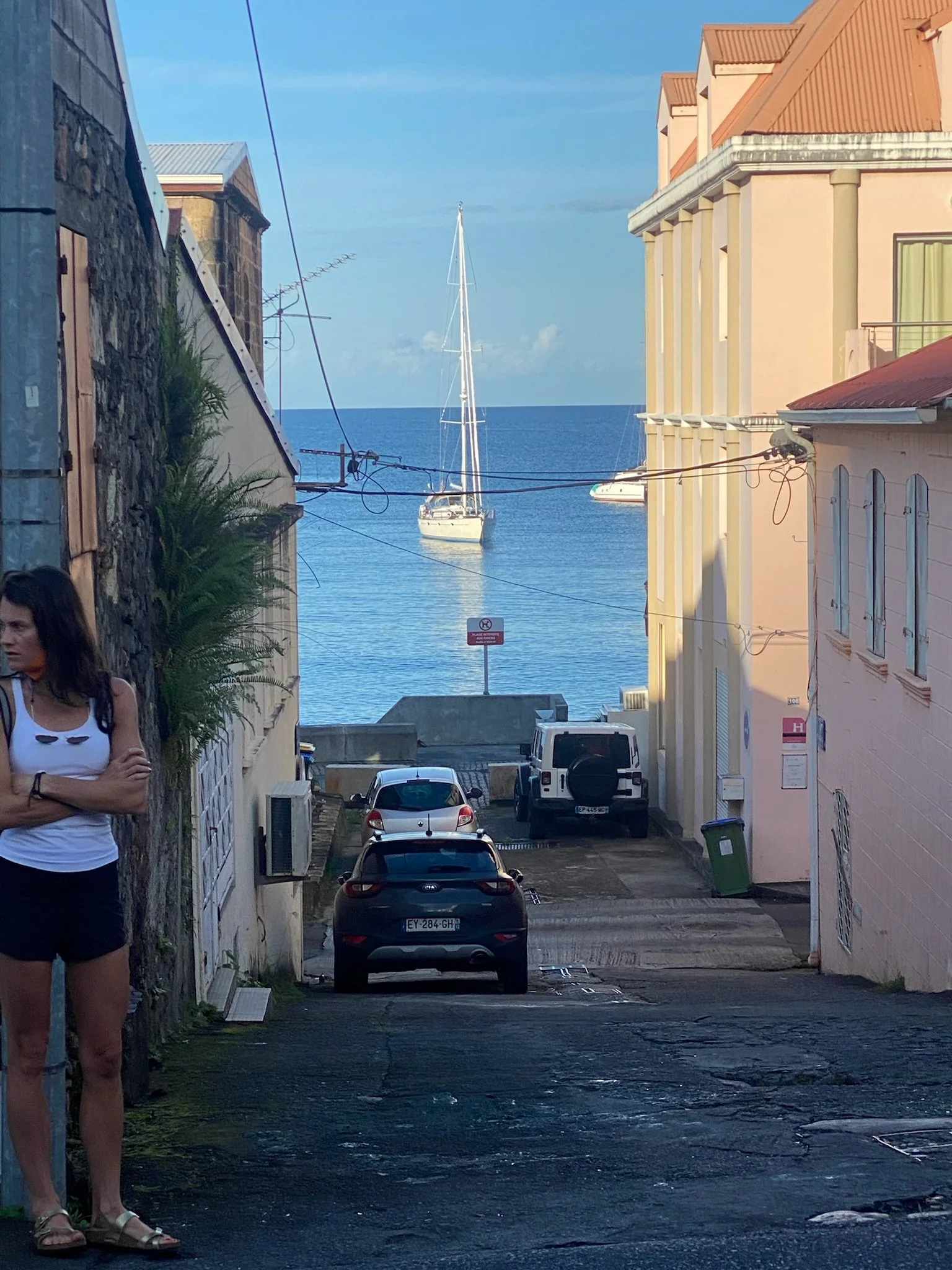an alley in Saint-Pierre with a clear view of Grace.