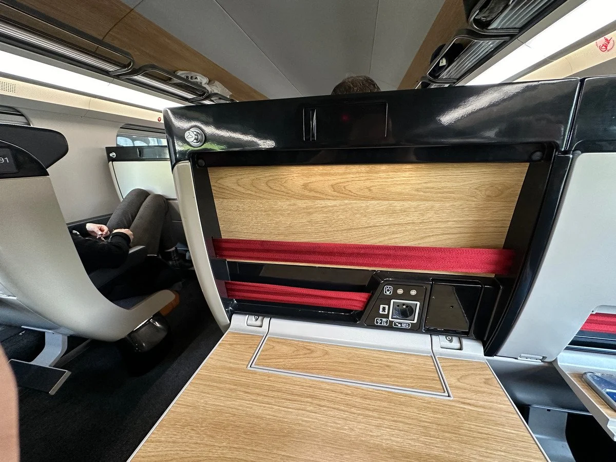 a large seat back tray on a TGV train.