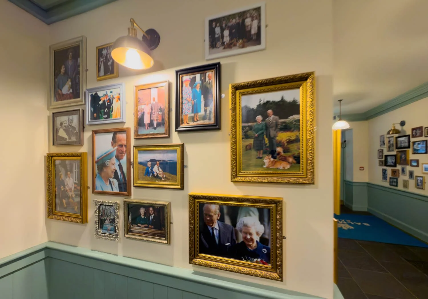Fun family pictures cover the walls near the restrooms