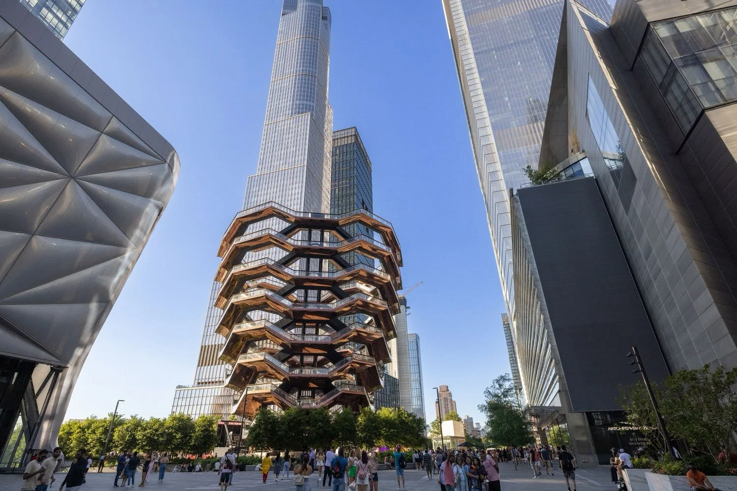 The Vessel surrounded by the buildings of Hudson Yards. 