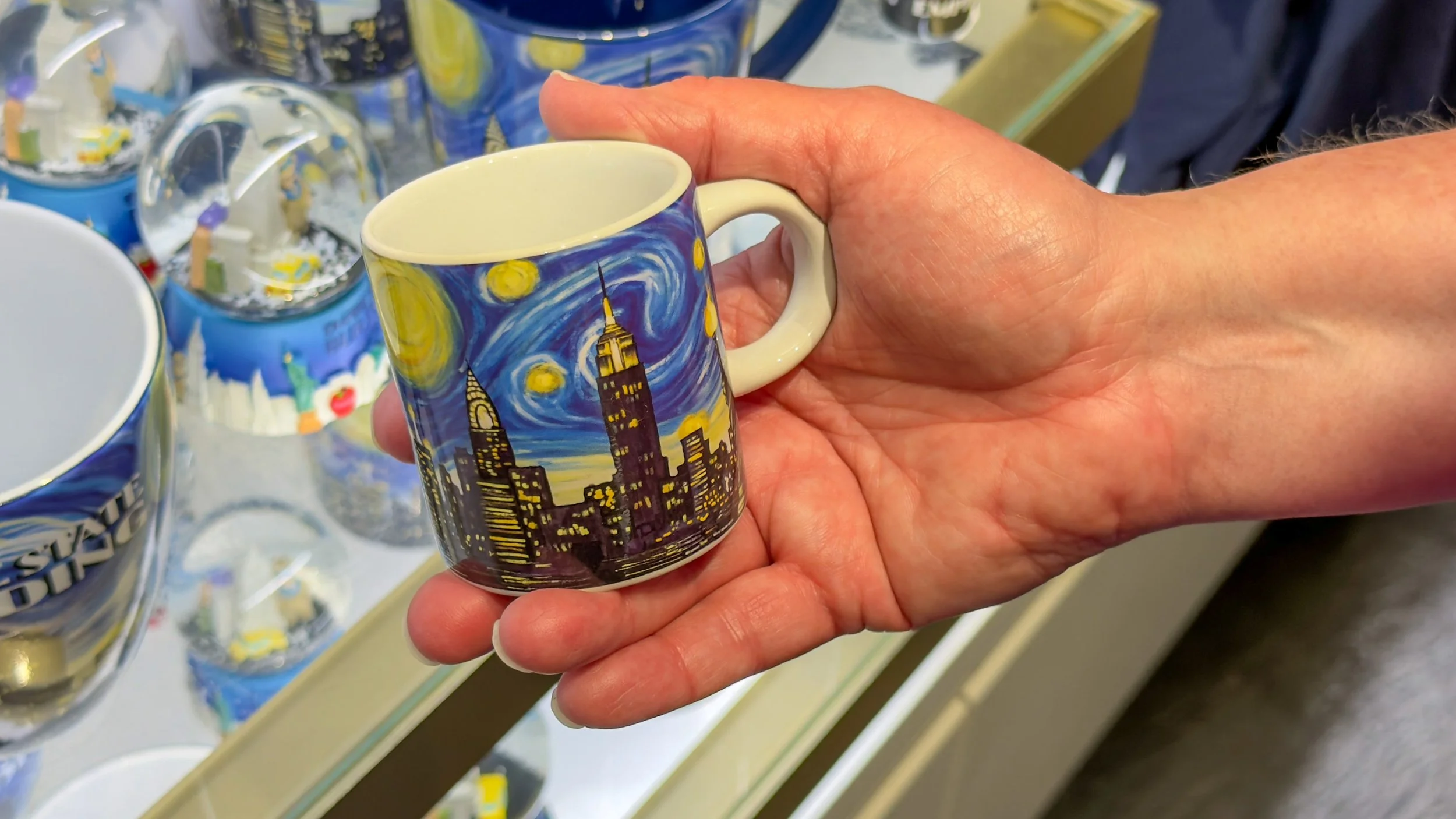 Debbie purchase a "Starry Night" espresso cup.