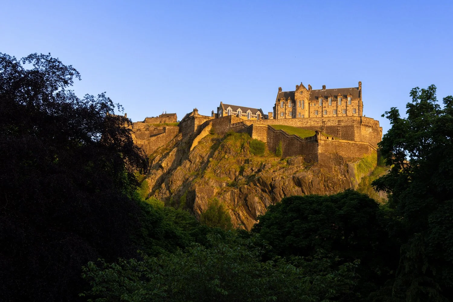 Sun setting on Edinburgh Castle