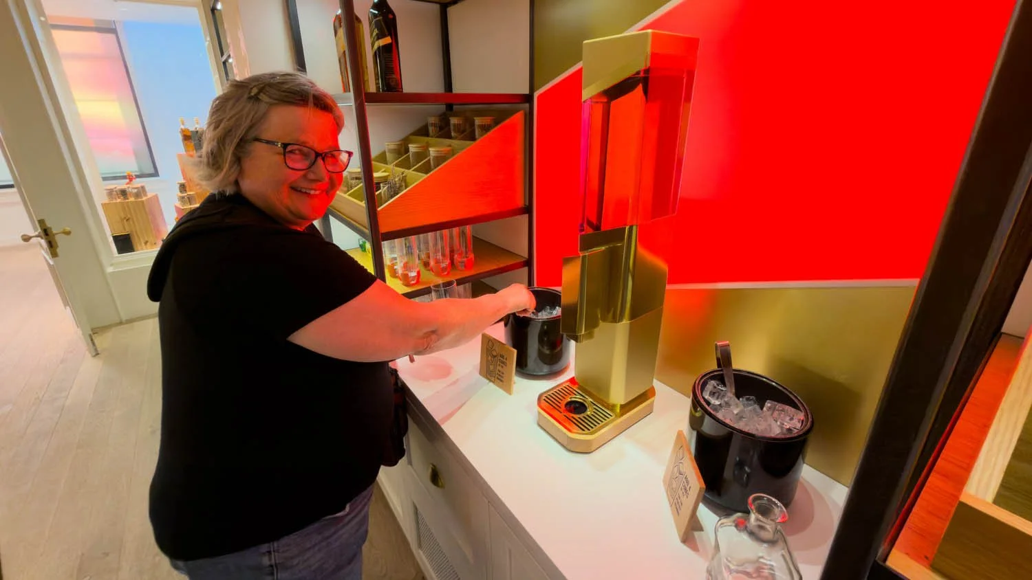 Debbie grabs a drink on the tour