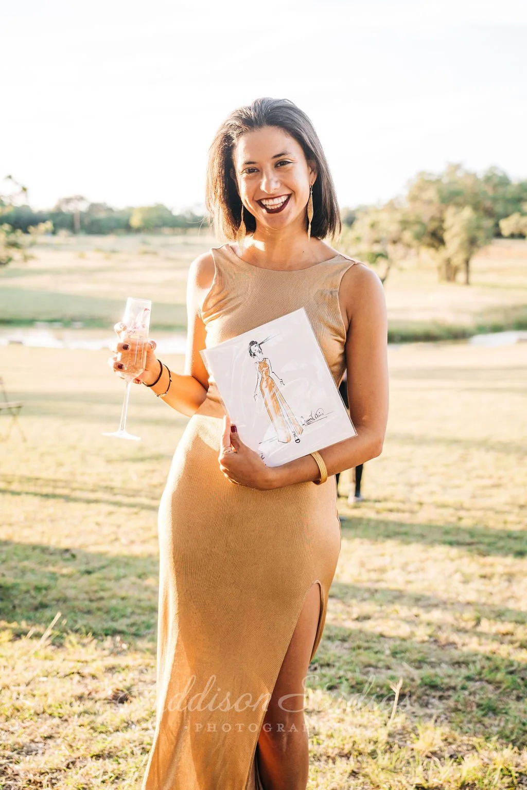 Ink and Marker fashion illustration of a wedding guest in a gold dress by Carmen Mosnia Hodge. Photo by Addison Studio 