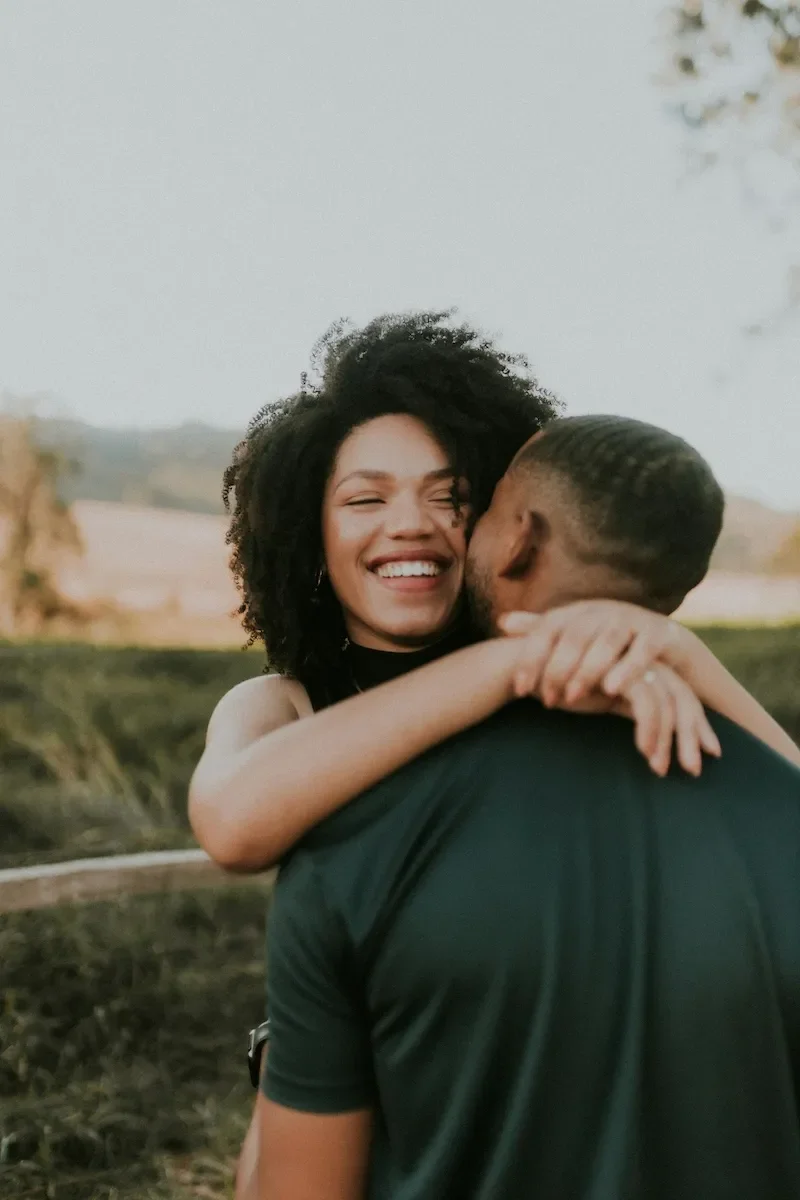 couple embracing and laughing
