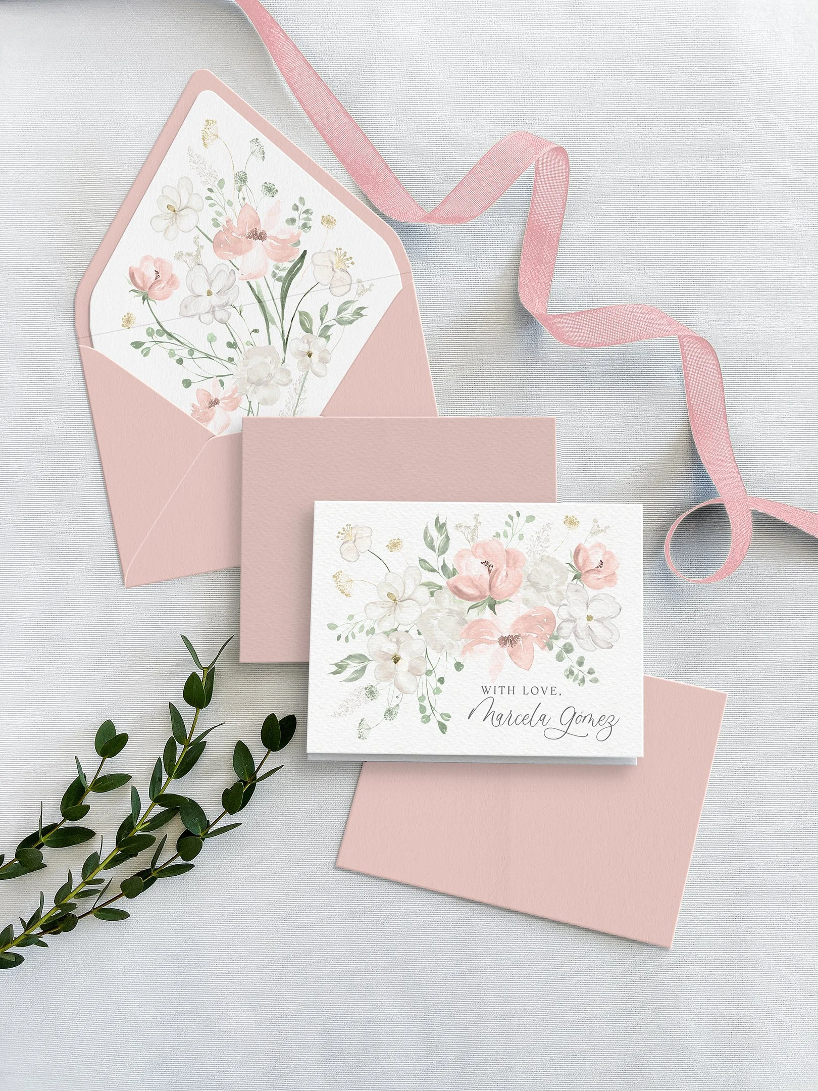 Personalized blush floral folded notecards set with coordinating envelopes and printed envelope liners.