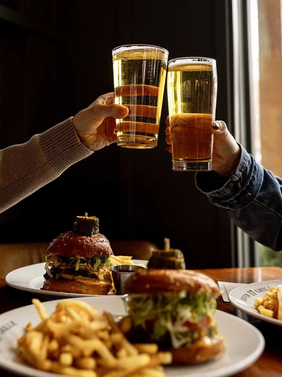 burgers + beers + you go good together ⁠
bring them to the place by the falls for burger night 🍔