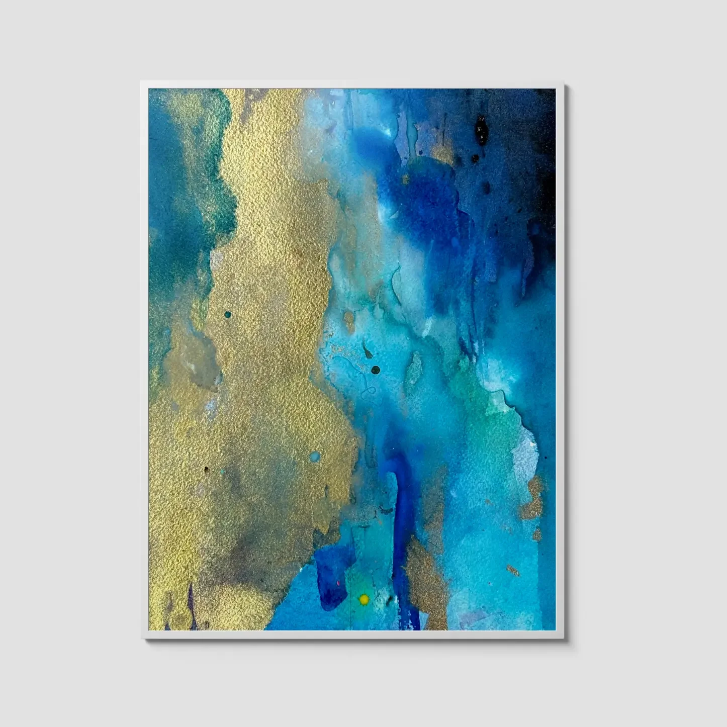 Abstract watercolor painting with layered blue and teal washes accented by textured metallic gold, displayed in a white frame.