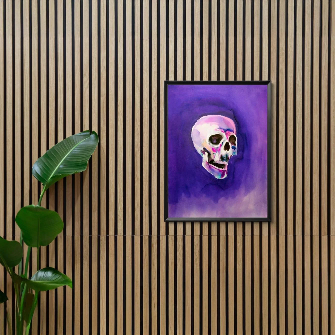 Framed skull artwork in purples and neons adds a bold, edgy focal point to a sleek, minimalist living space.