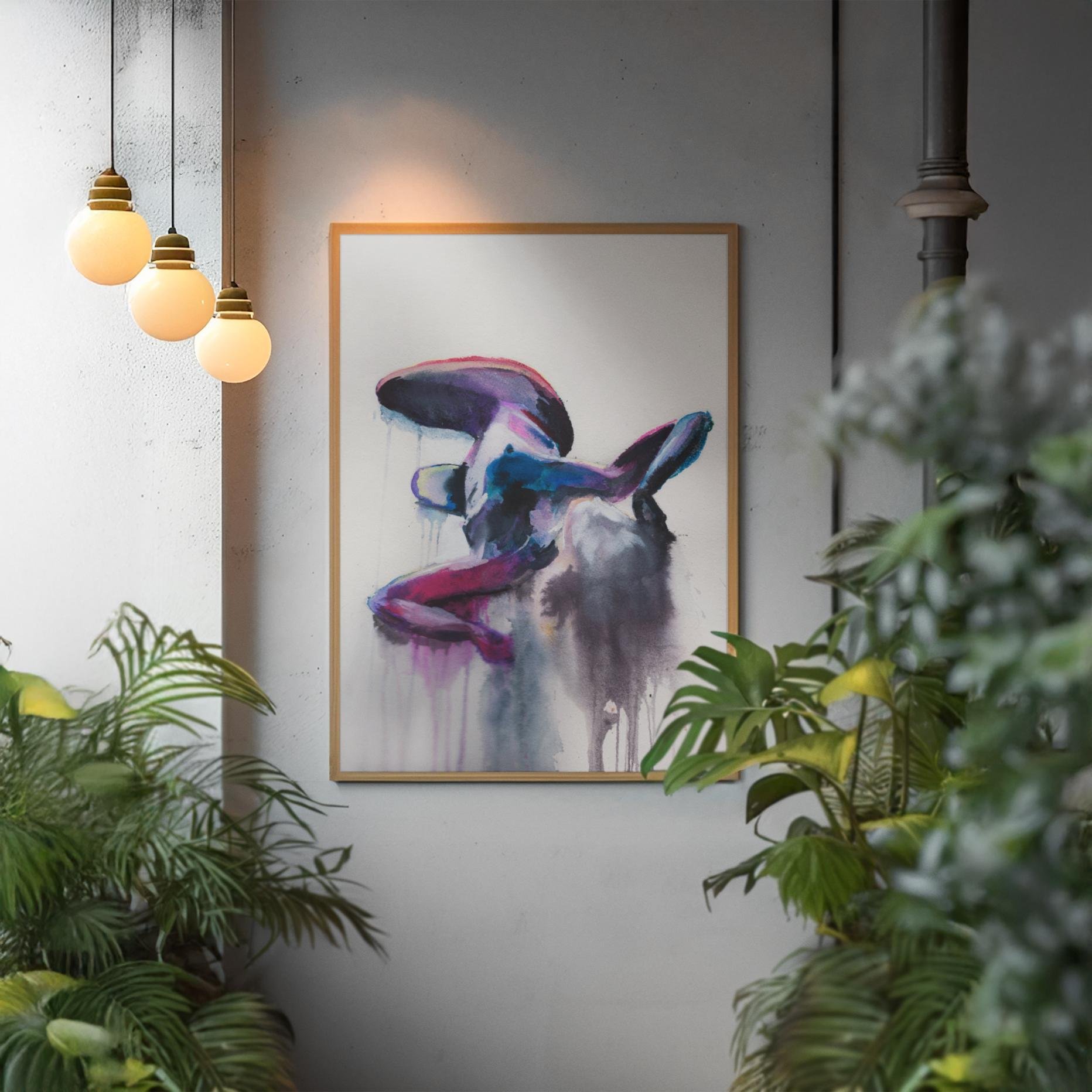 “Laying Splash” painting displayed in a modern interior surrounded by greenery and globe lighting, creating a calming yet provocative ambiance.