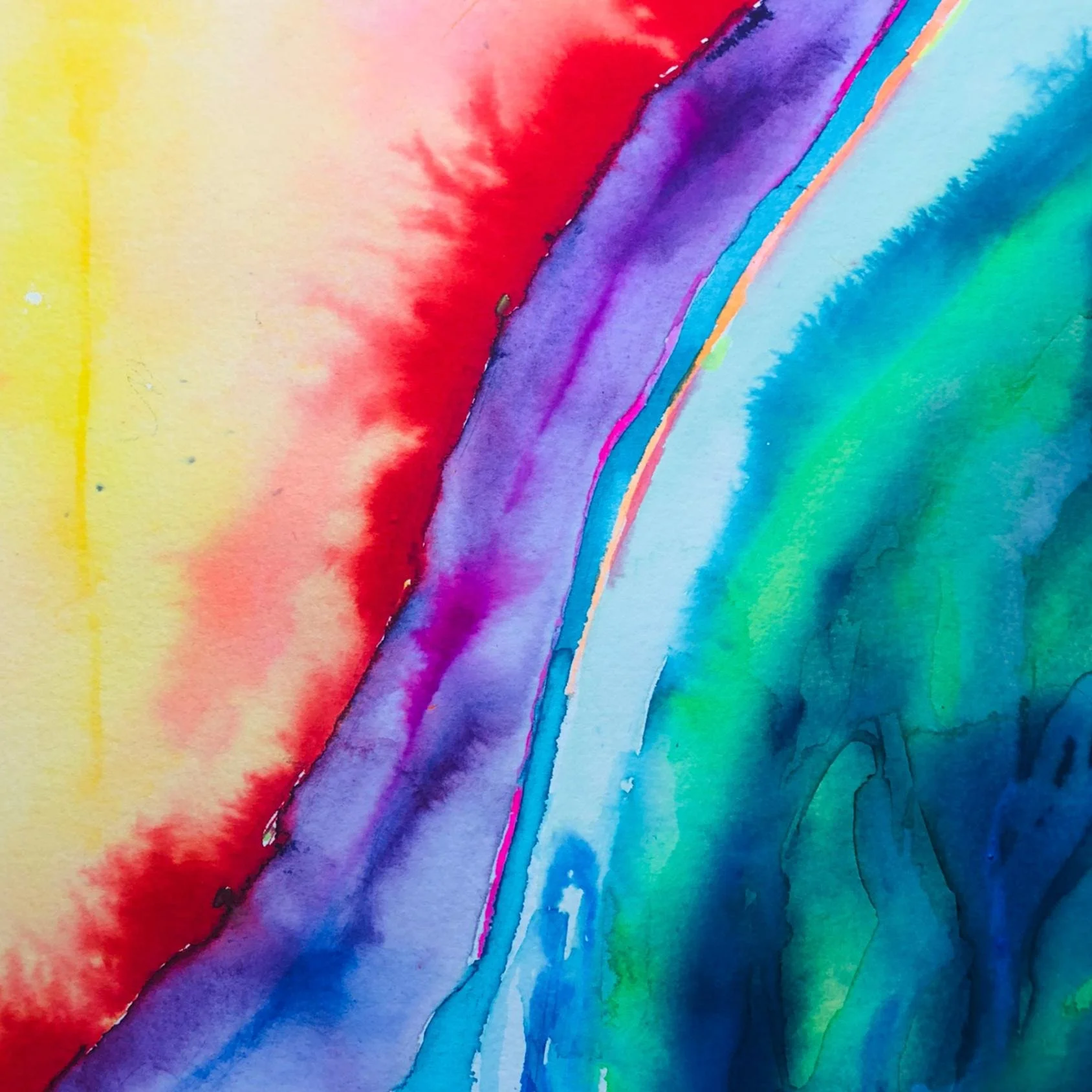 Detail from Red Iris shows bold red edges, soft purples, and deep blues flowing into one another with striking contrast and smooth transitions.