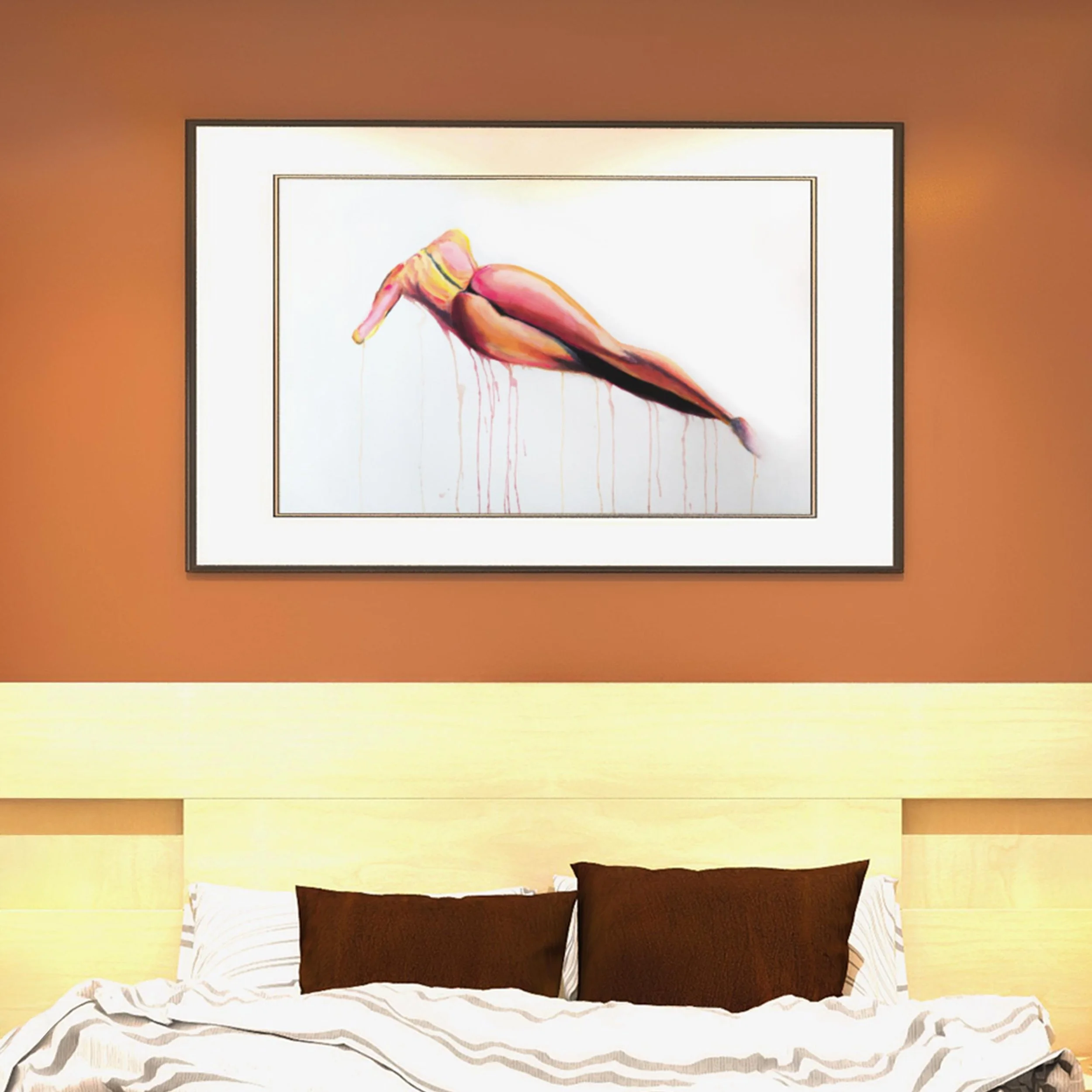 Framed painting displayed above a modern bed with burnt orange walls and spotlighting, adding warmth and sensuality to the bedroom setting.