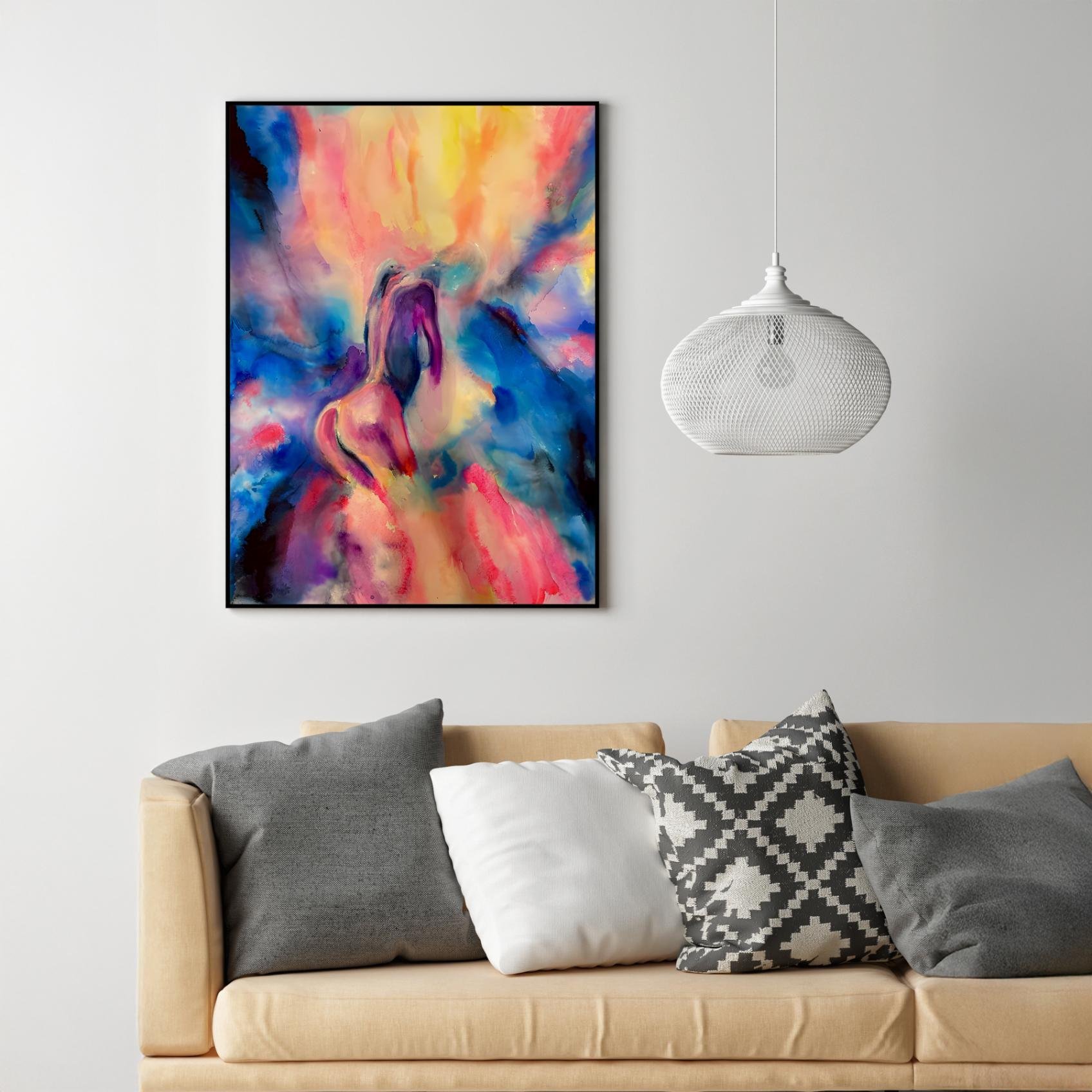 A vibrant abstract nude painting in pinks and purples hangs above a beige couch with black-and-white pillows.