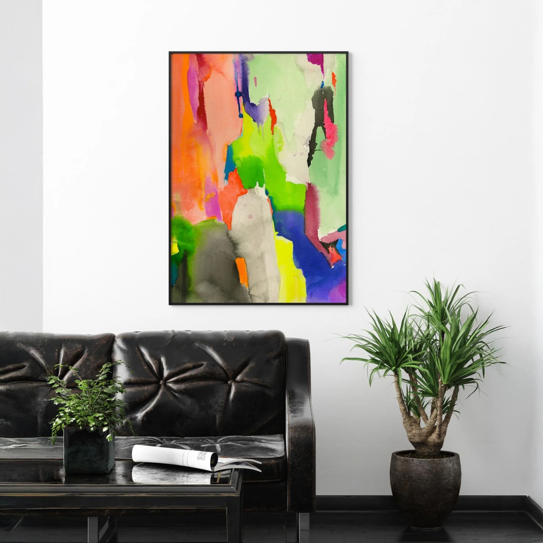Abstract artwork in neon green, orange, and deep violet adds bold contrast to a sleek black leather sofa and modern living room decor.