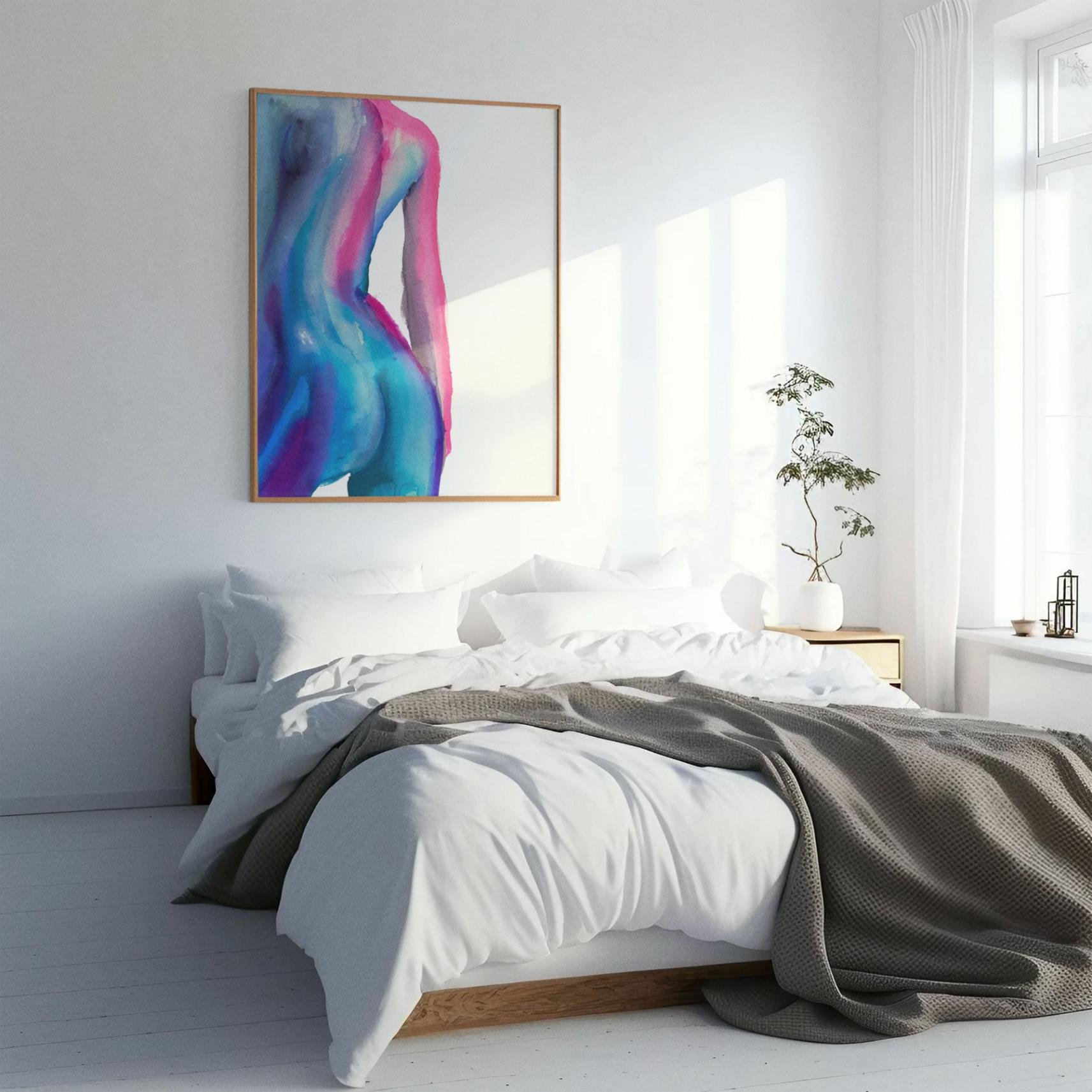 Framed “Aqua Back” hanging above a white bed in a bright, modern bedroom with minimal decor and natural sunlight streaming through the window.