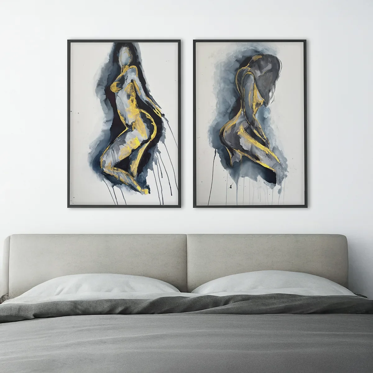 Black and gold sensual nude diptych paintings displayed above a bed in a modern bedroom by artist Nick Horvath.