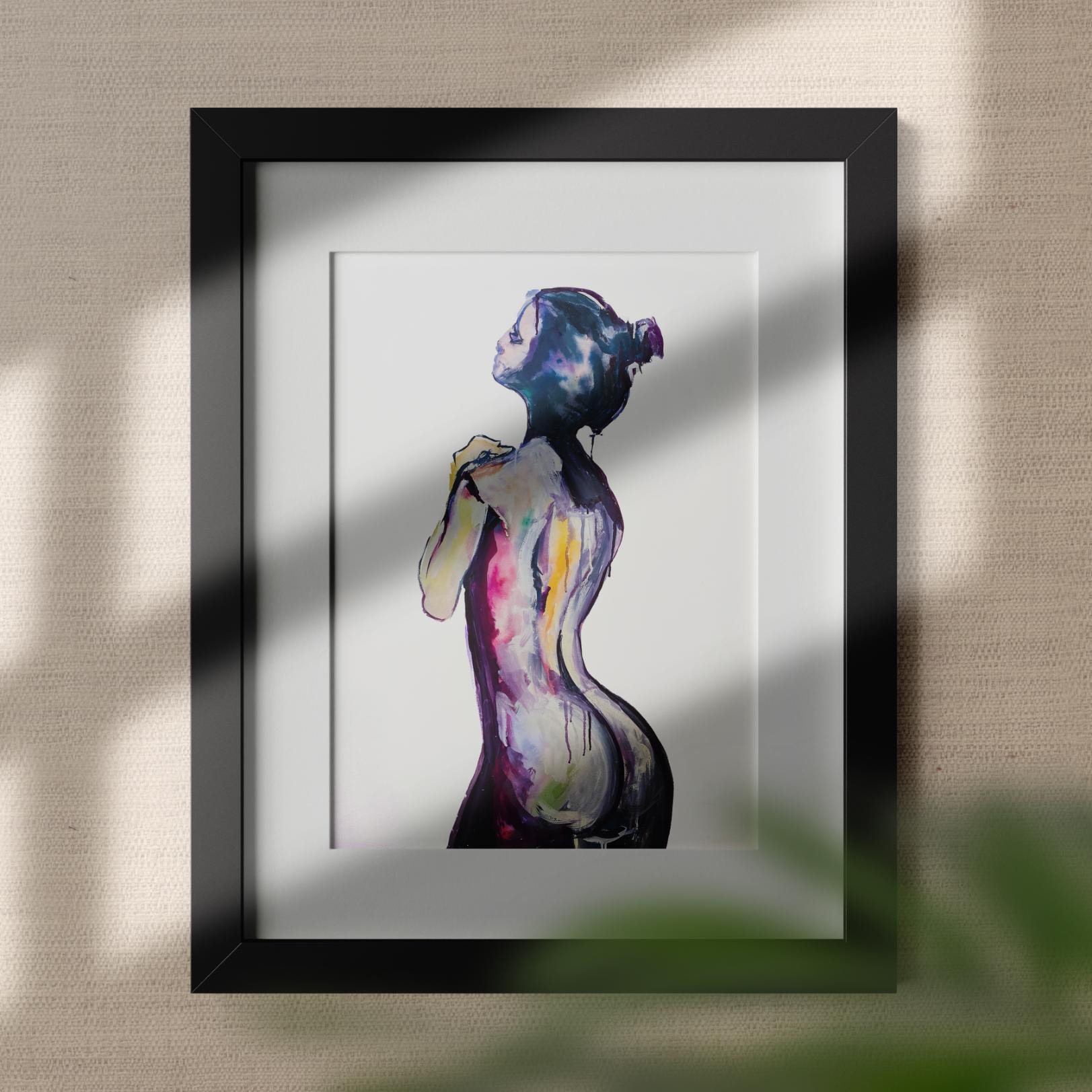 Watercolor figure art framed in black and hung on a neutral wall, showcasing elegant curves and expressive brushwork.
