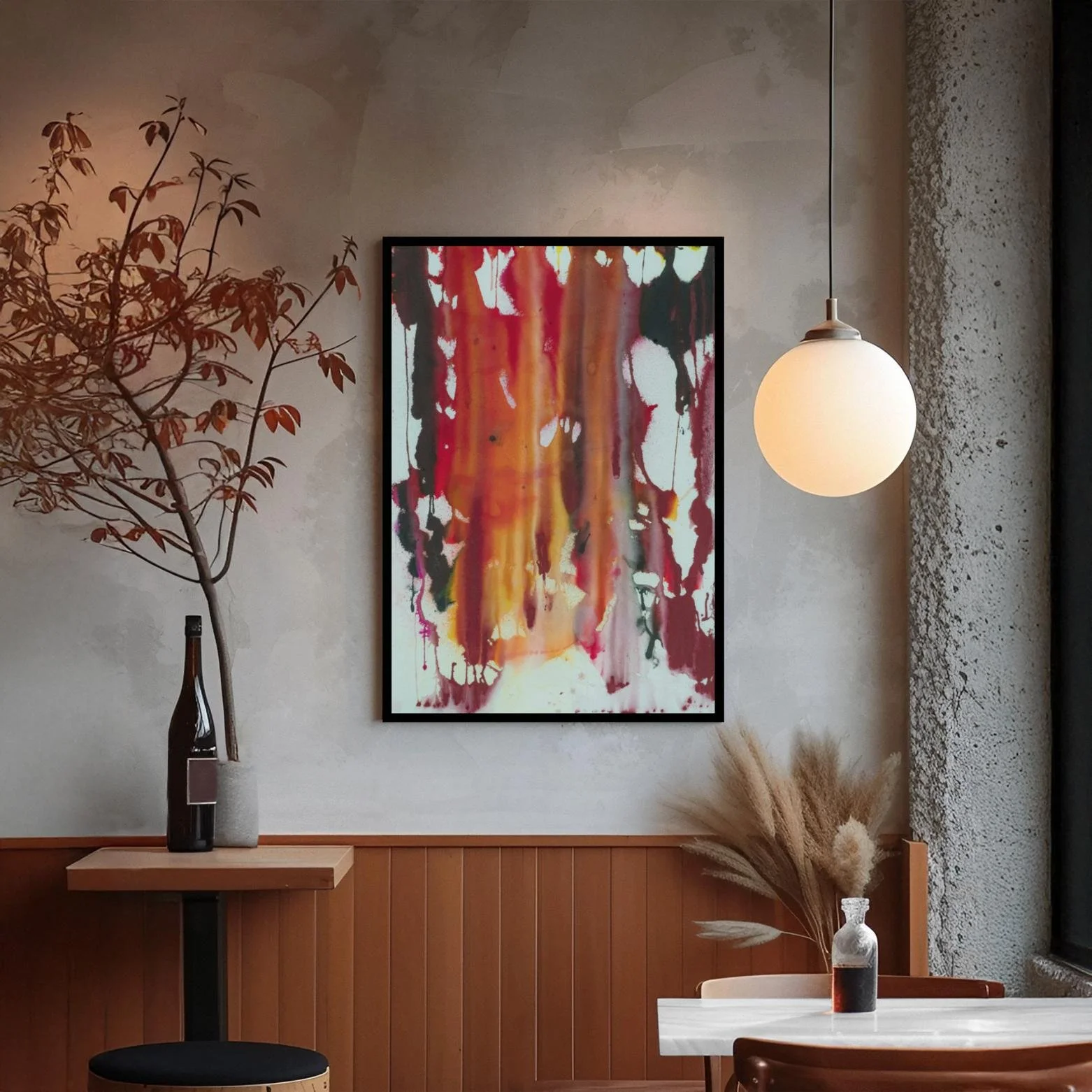 “Summer Sweat” hanging in a stylish café setting with warm tones, pendant lighting, and decorative foliage.